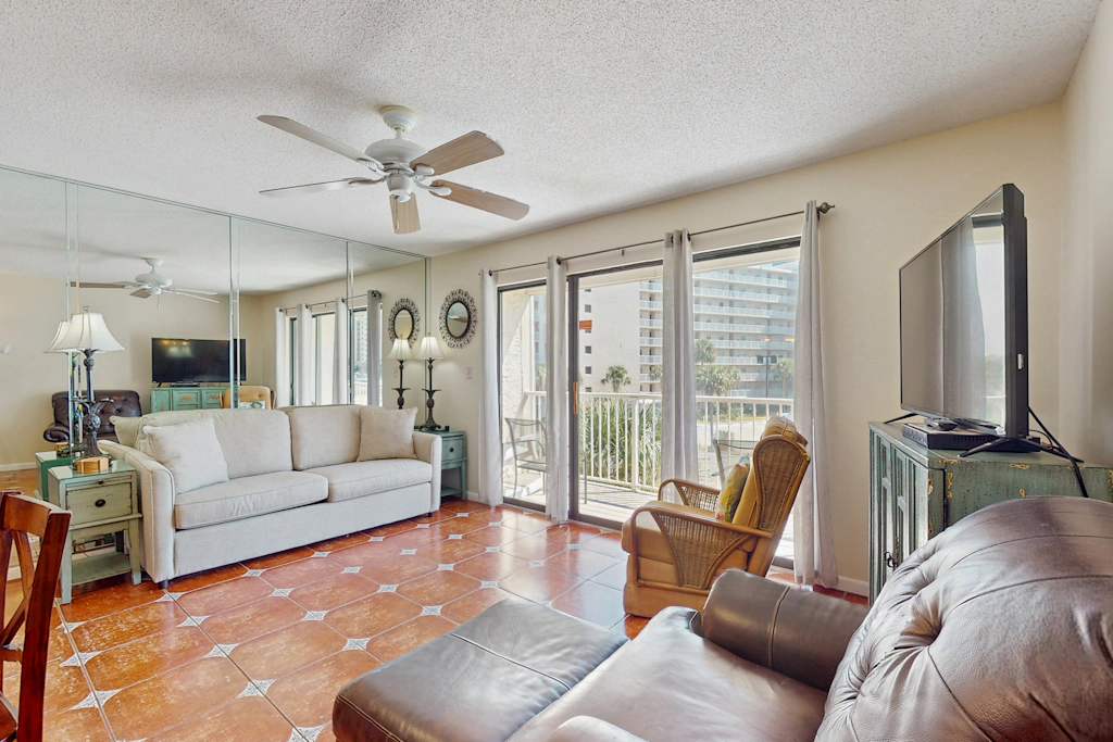 Coastal condo with water views, shared pool, and tennis court