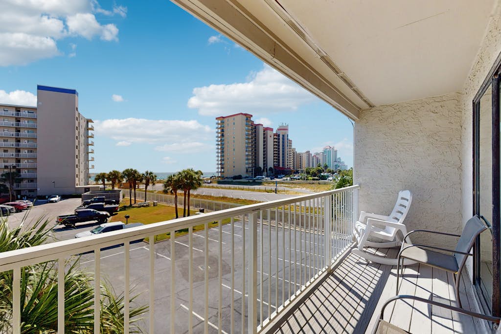 Coastal condo with water views, shared pool, and tennis court