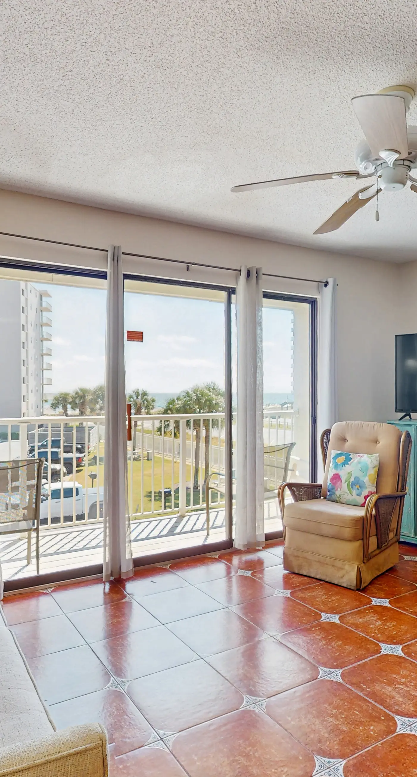 Coastal condo with water views, shared pool, and tennis court