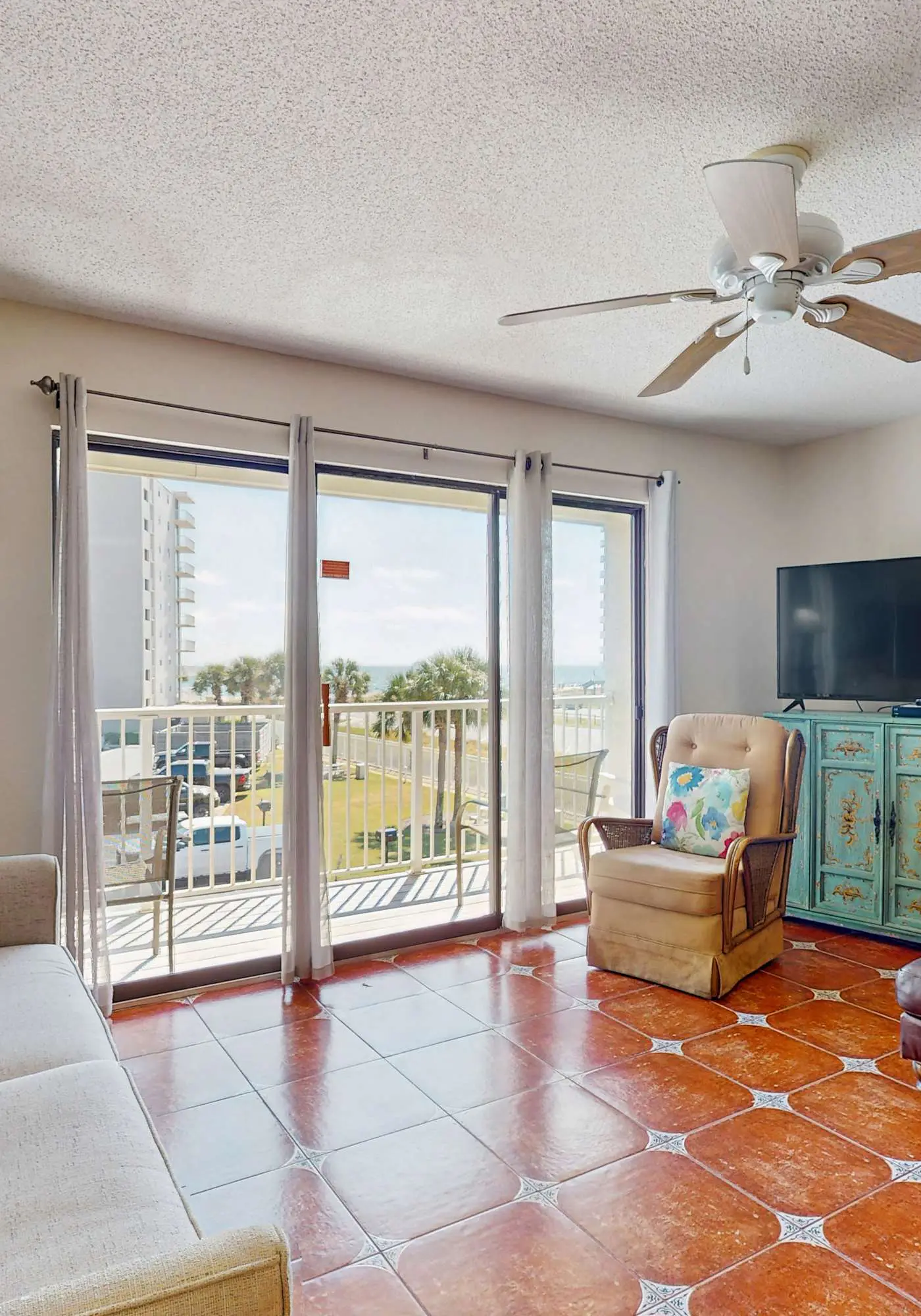 Coastal condo with water views, shared pool, and tennis court
