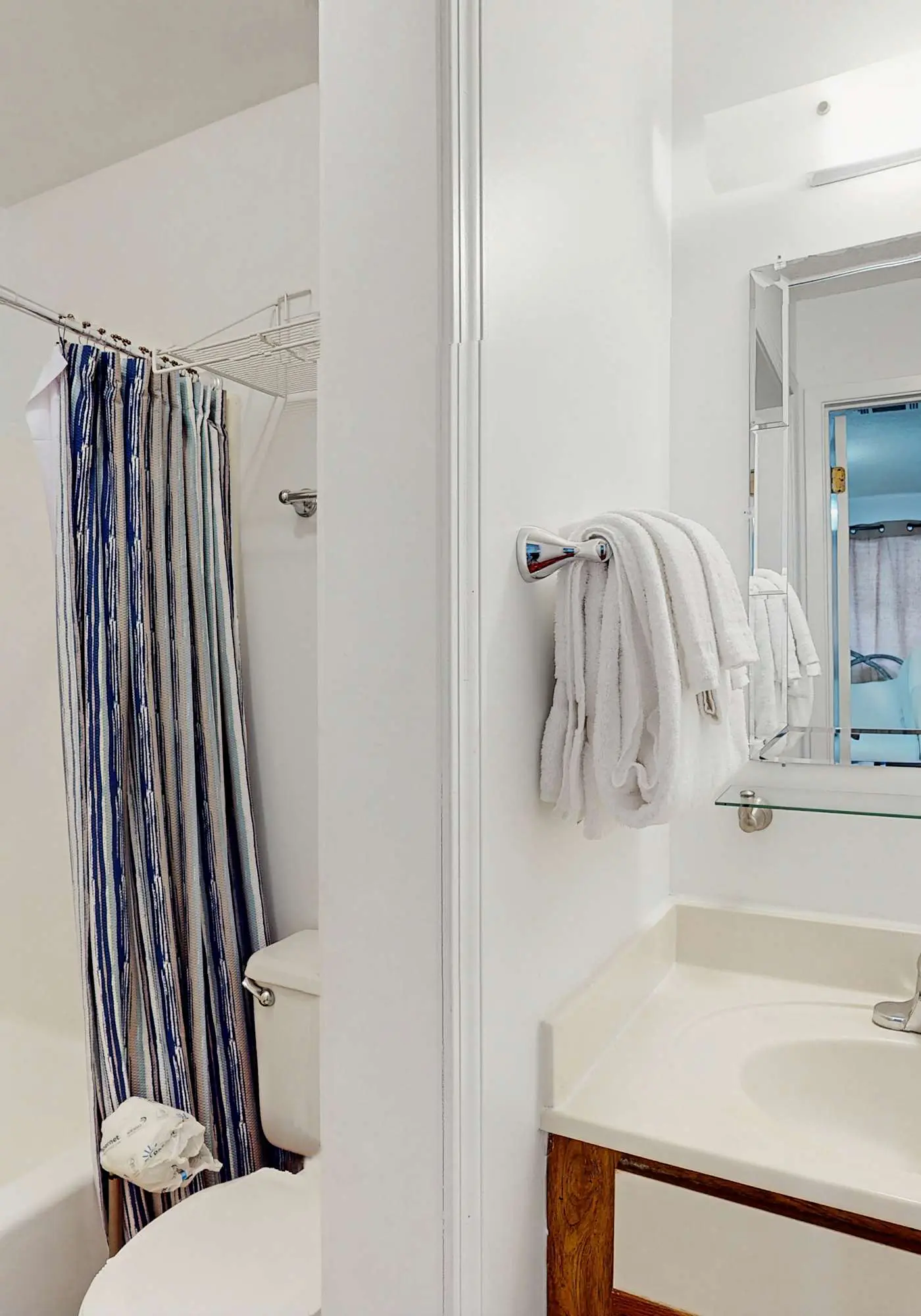 Coastal condo with water views, shared pool, and tennis court