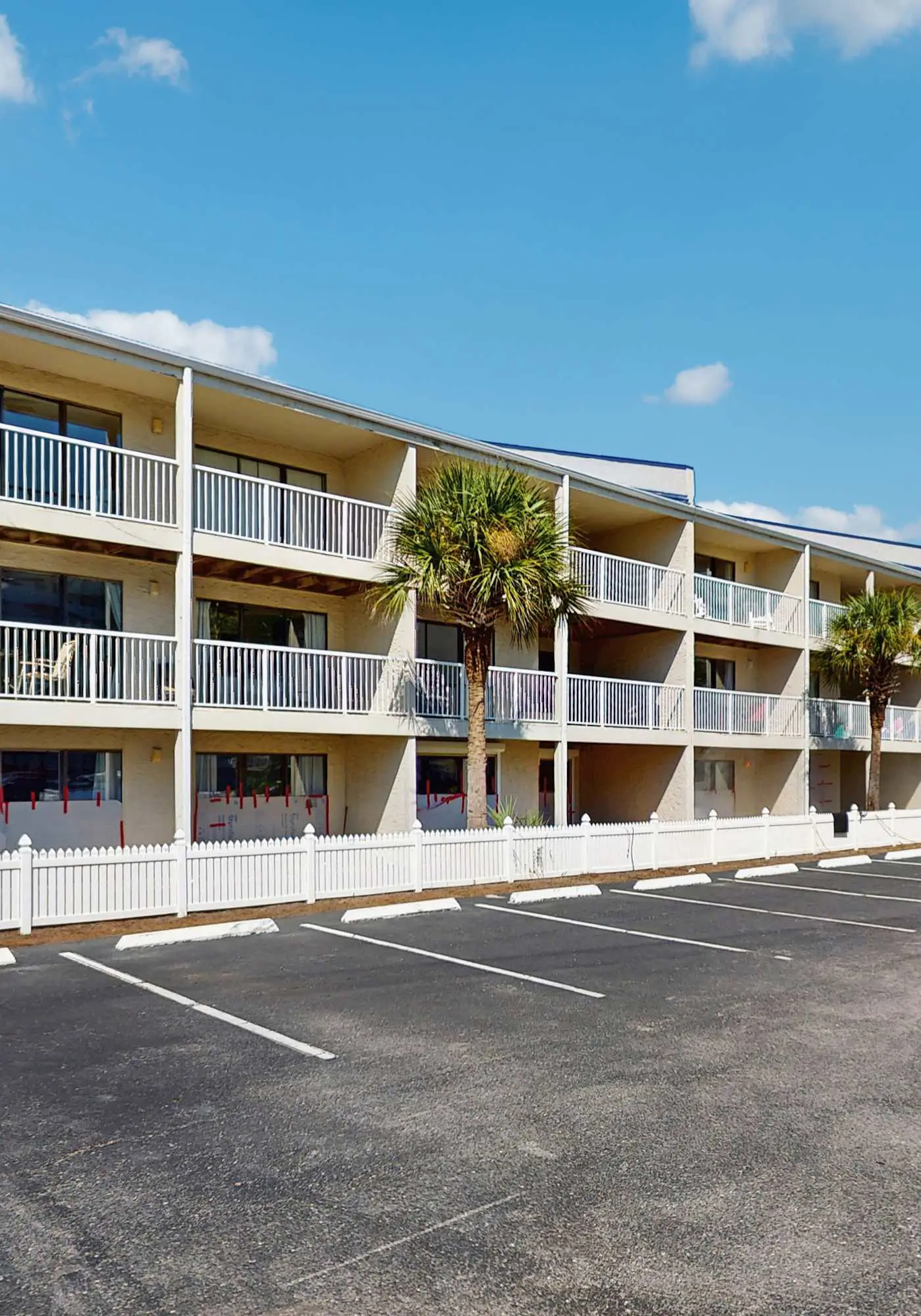 Coastal condo with water views, shared pool, and tennis court