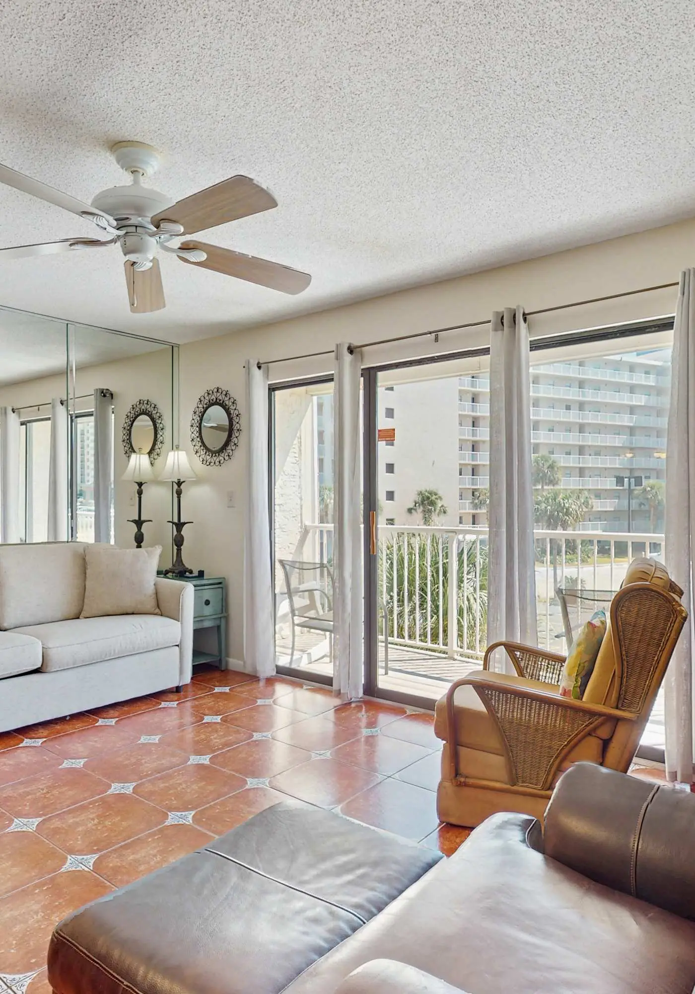 Coastal condo with water views, shared pool, and tennis court