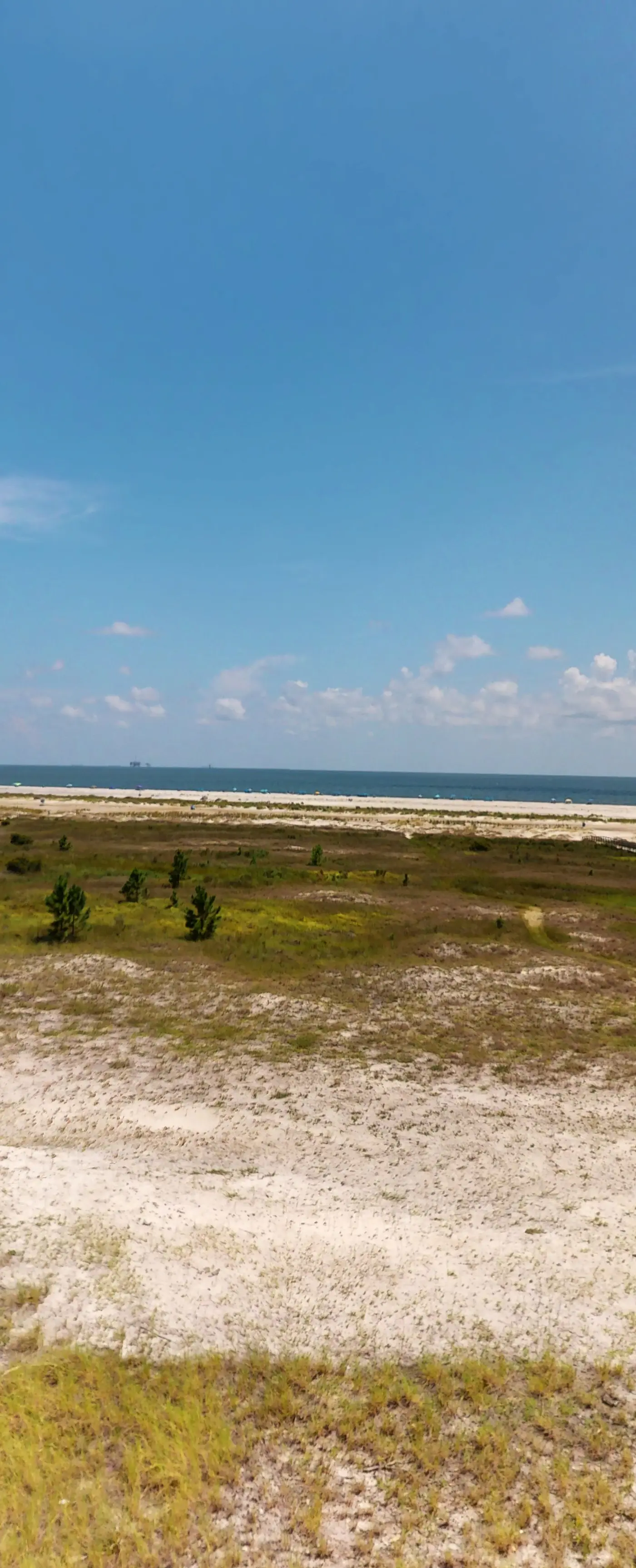 Beachfront condo with pool, private balcony, and laundry