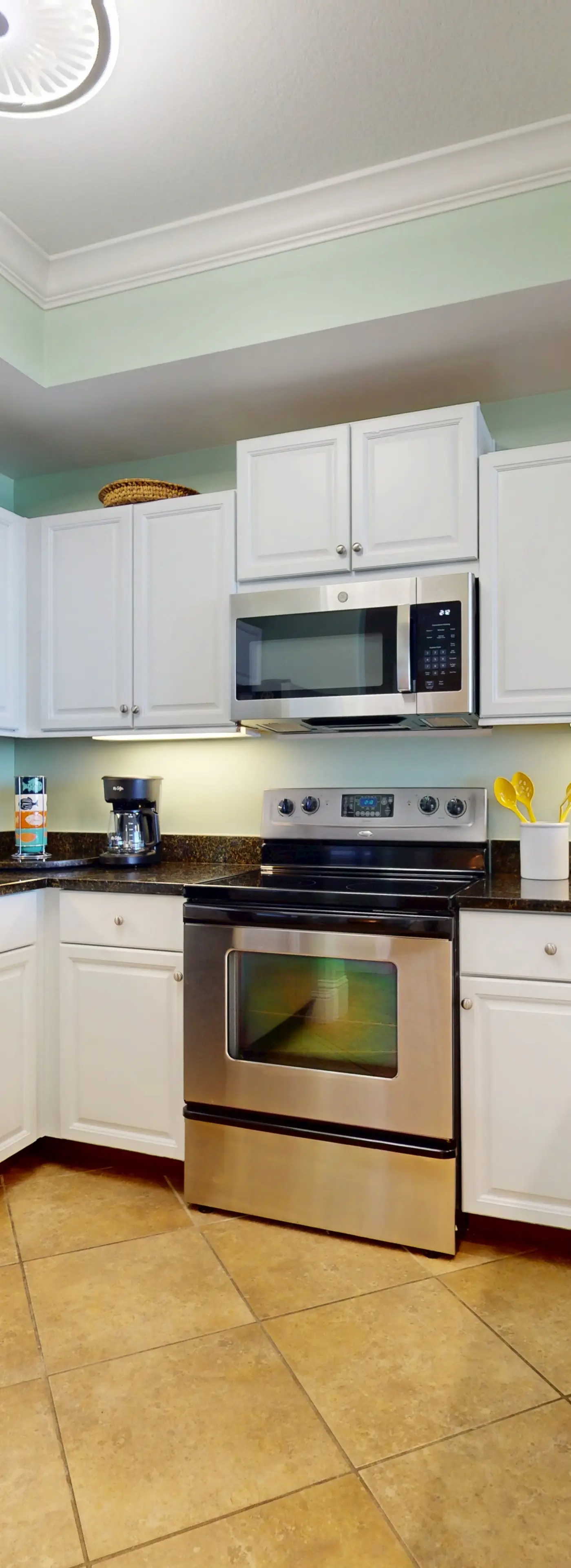 Beachfront condo with pool, private balcony, and laundry