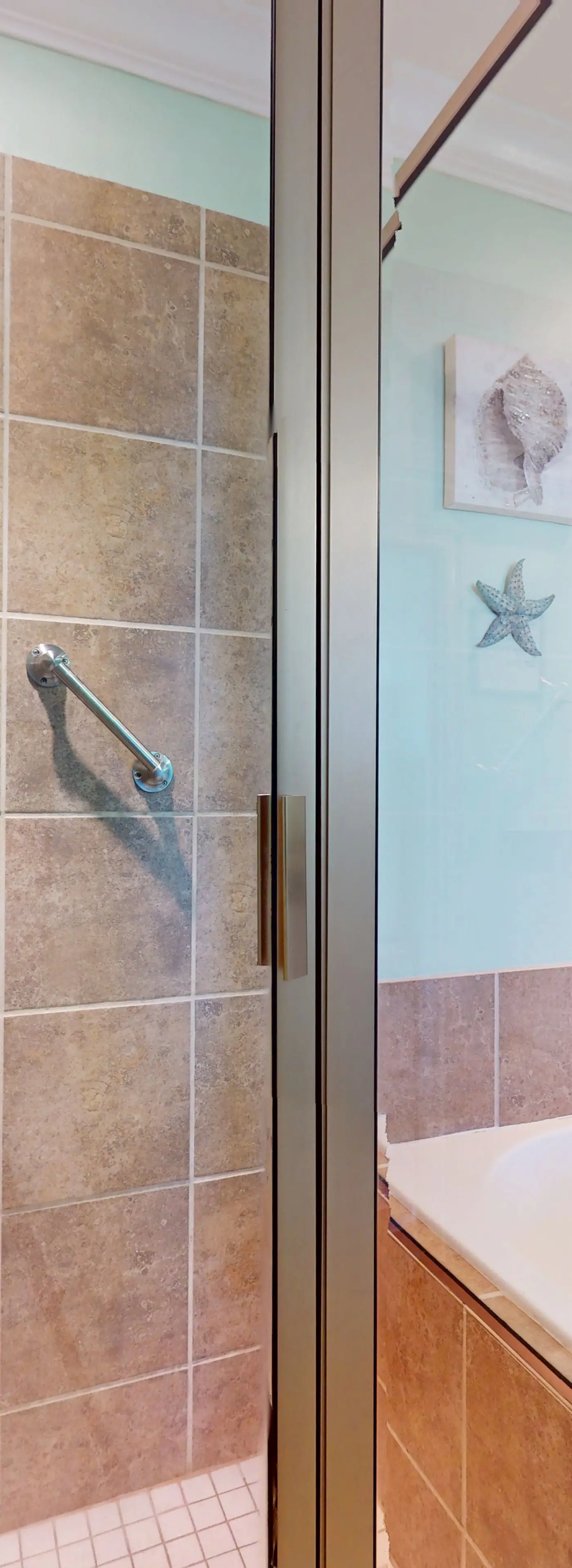 Beachfront condo with pool, private balcony, and laundry