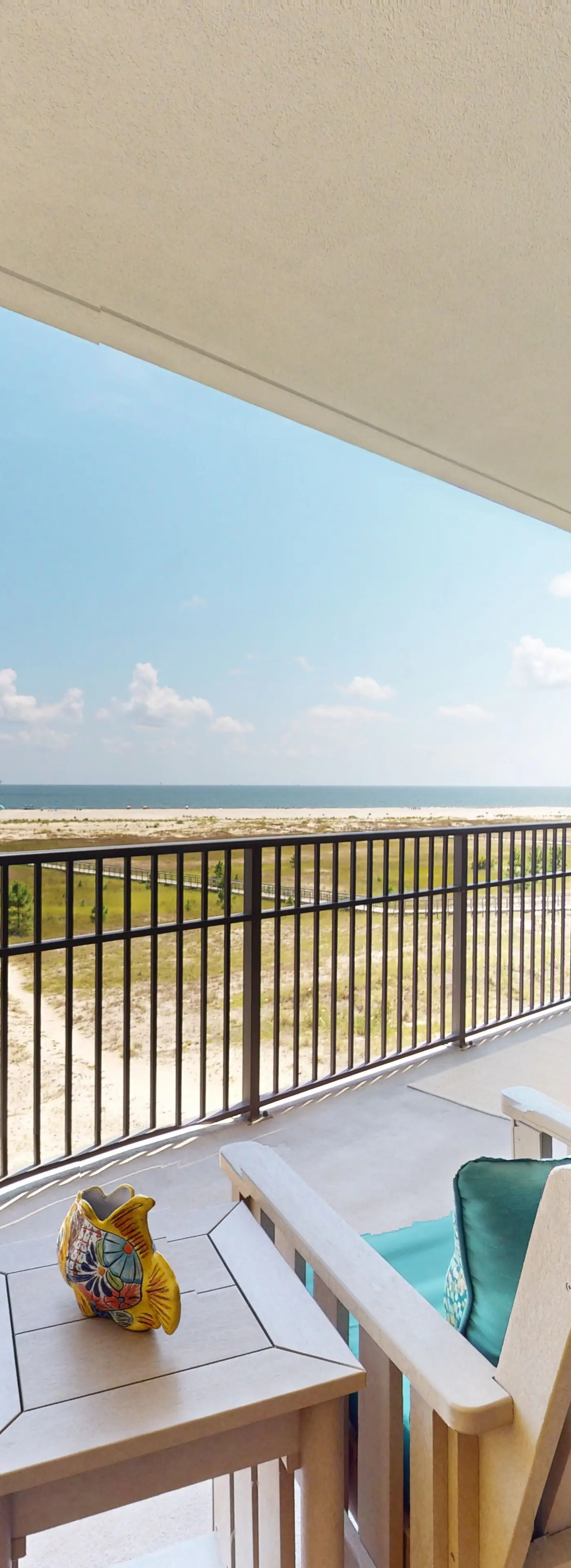 Beachfront condo with pool, private balcony, and laundry