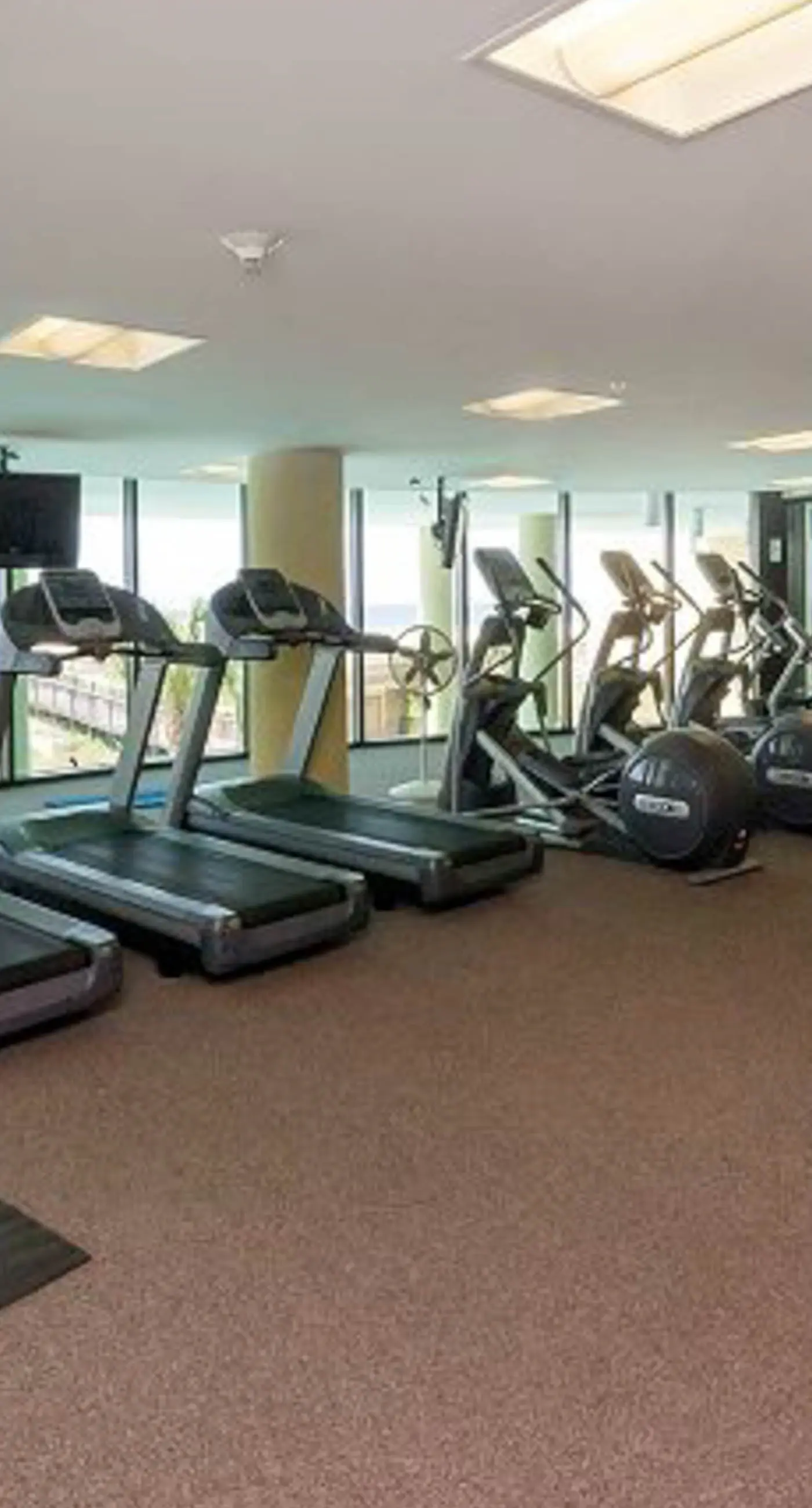 Beachfront condo with pool, private balcony, and laundry