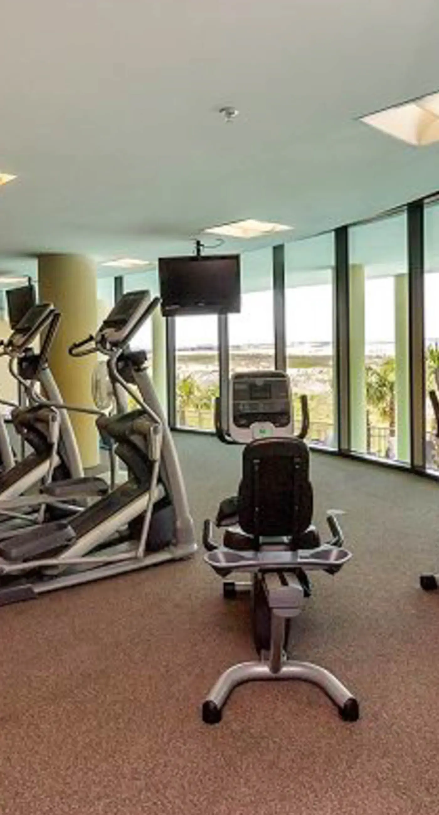 Beachfront condo with pool, private balcony, and laundry