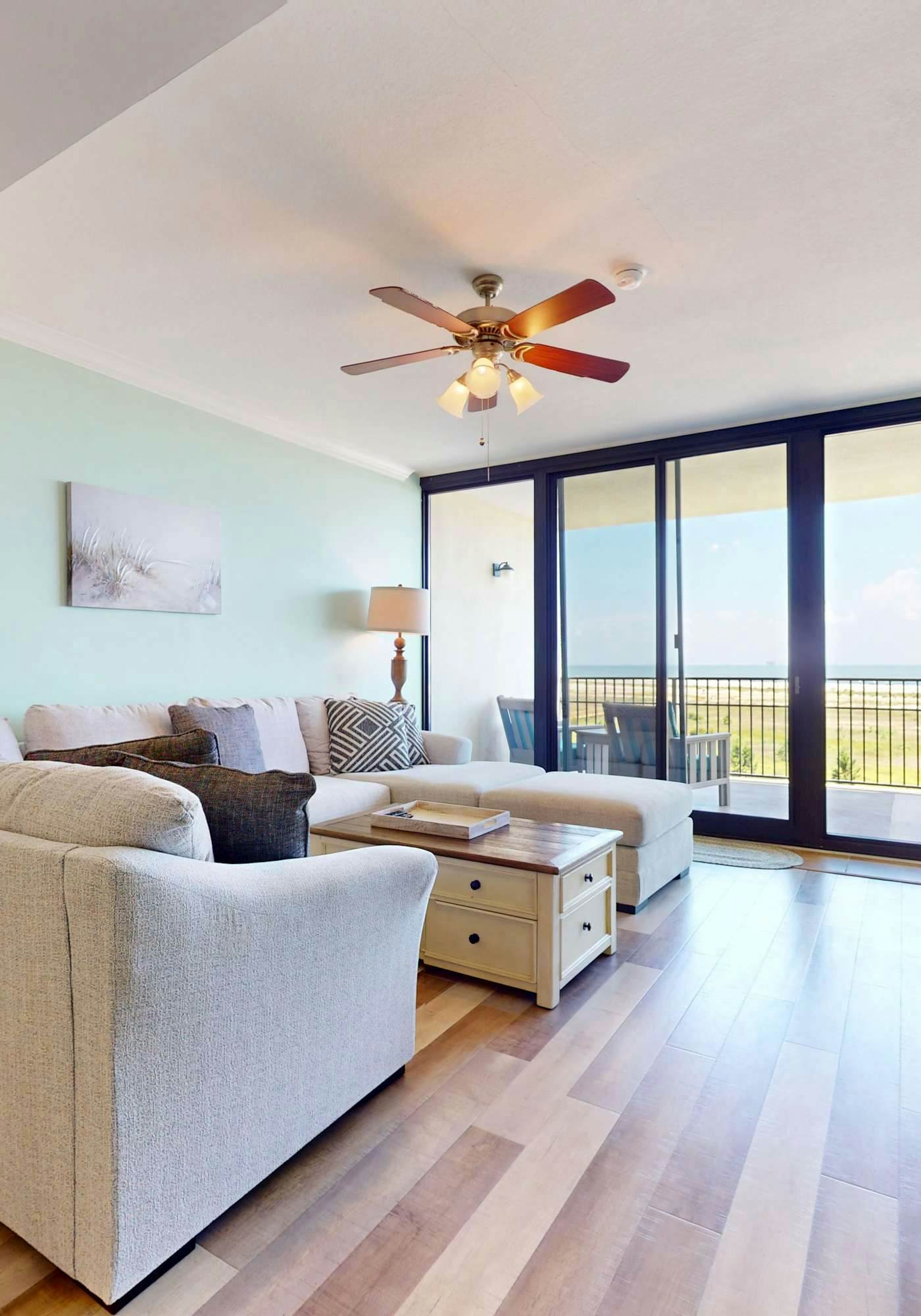 Beachfront condo with pool, private balcony, and laundry