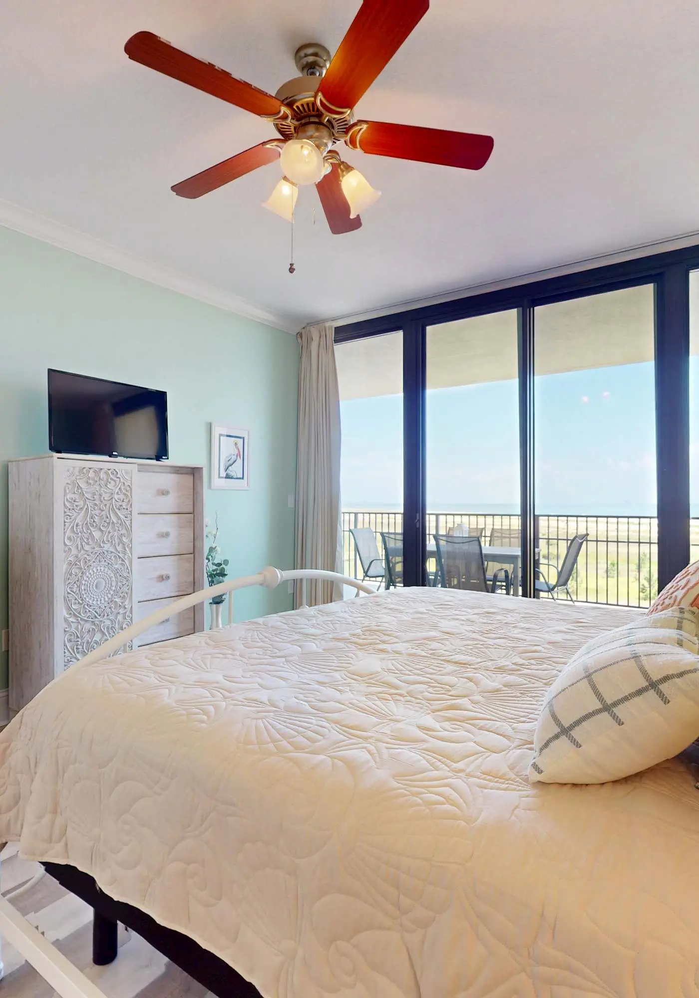 Beachfront condo with pool, private balcony, and laundry