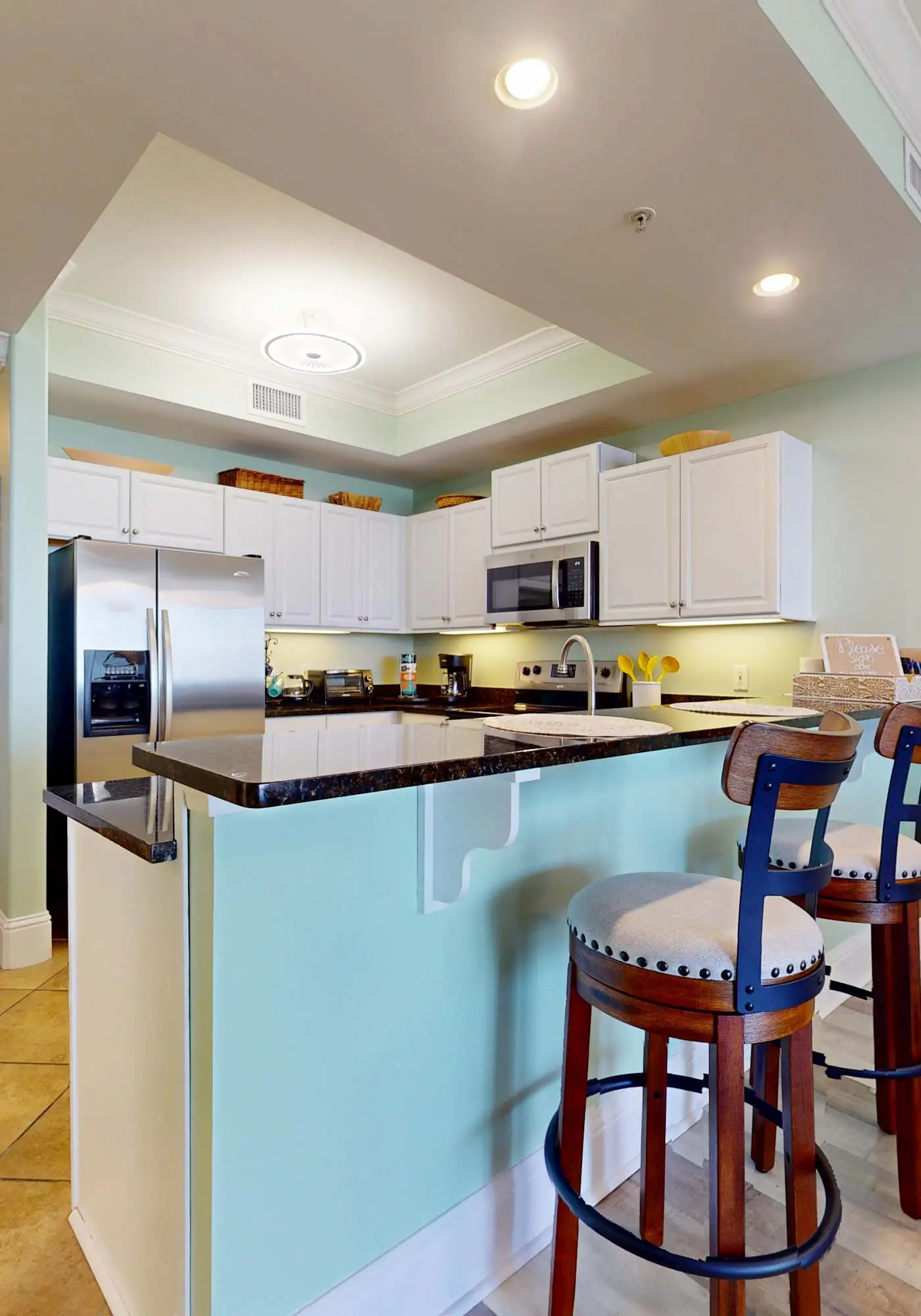 Beachfront condo with pool, private balcony, and laundry