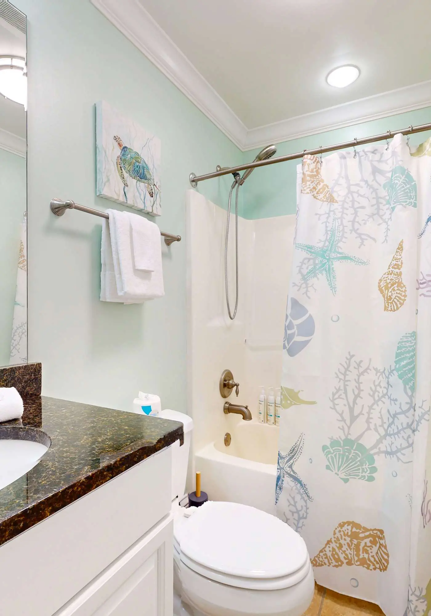 Beachfront condo with pool, private balcony, and laundry