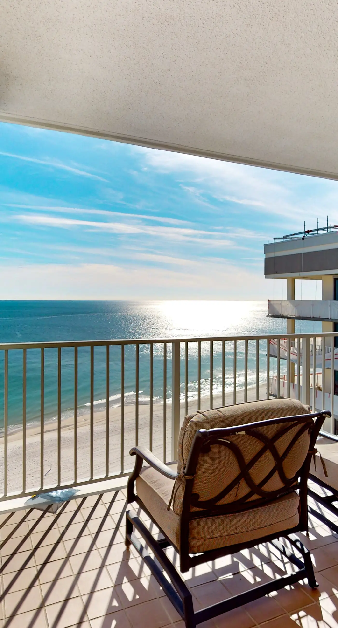 Waterfront oasis with direct beach access, pool, hot tub, & gym