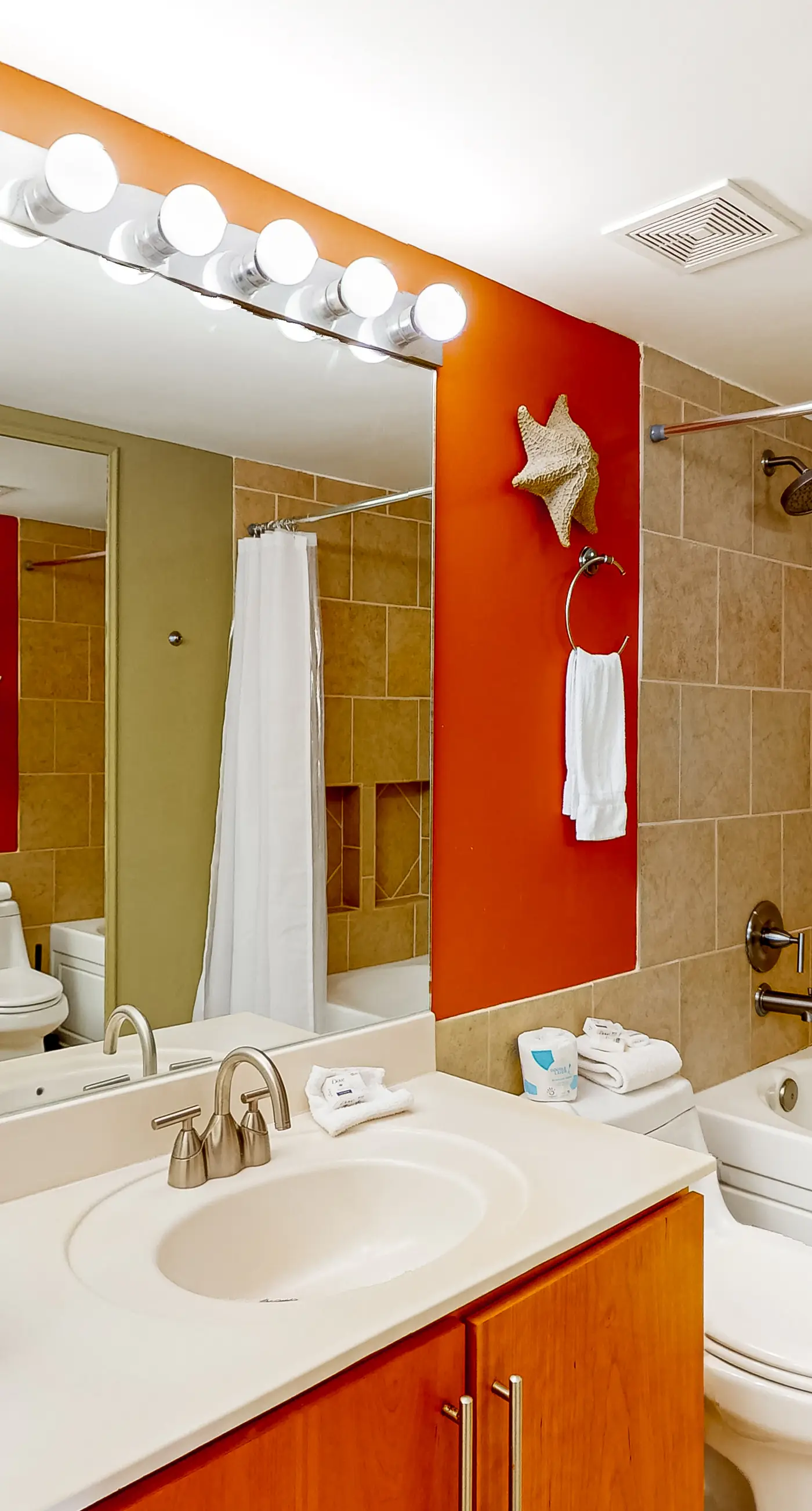 Waterfront oasis with direct beach access, pool, hot tub, & gym