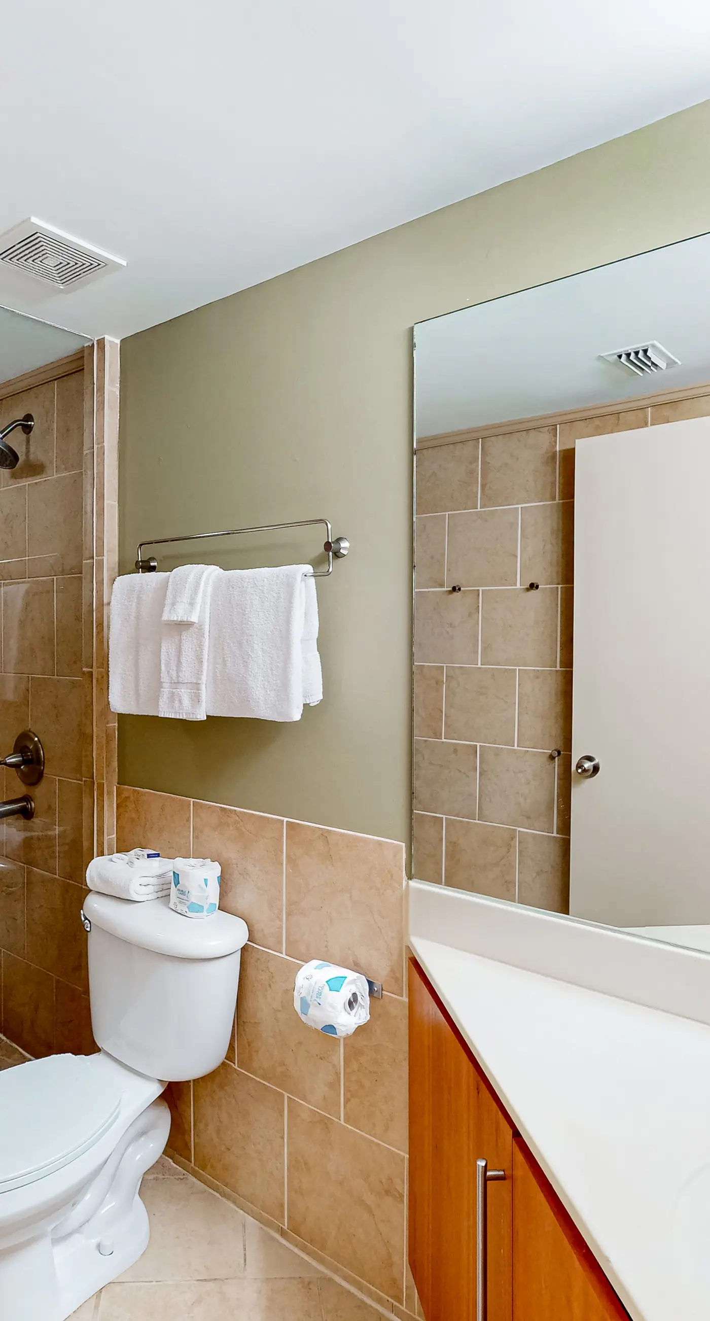 Waterfront oasis with direct beach access, pool, hot tub, & gym