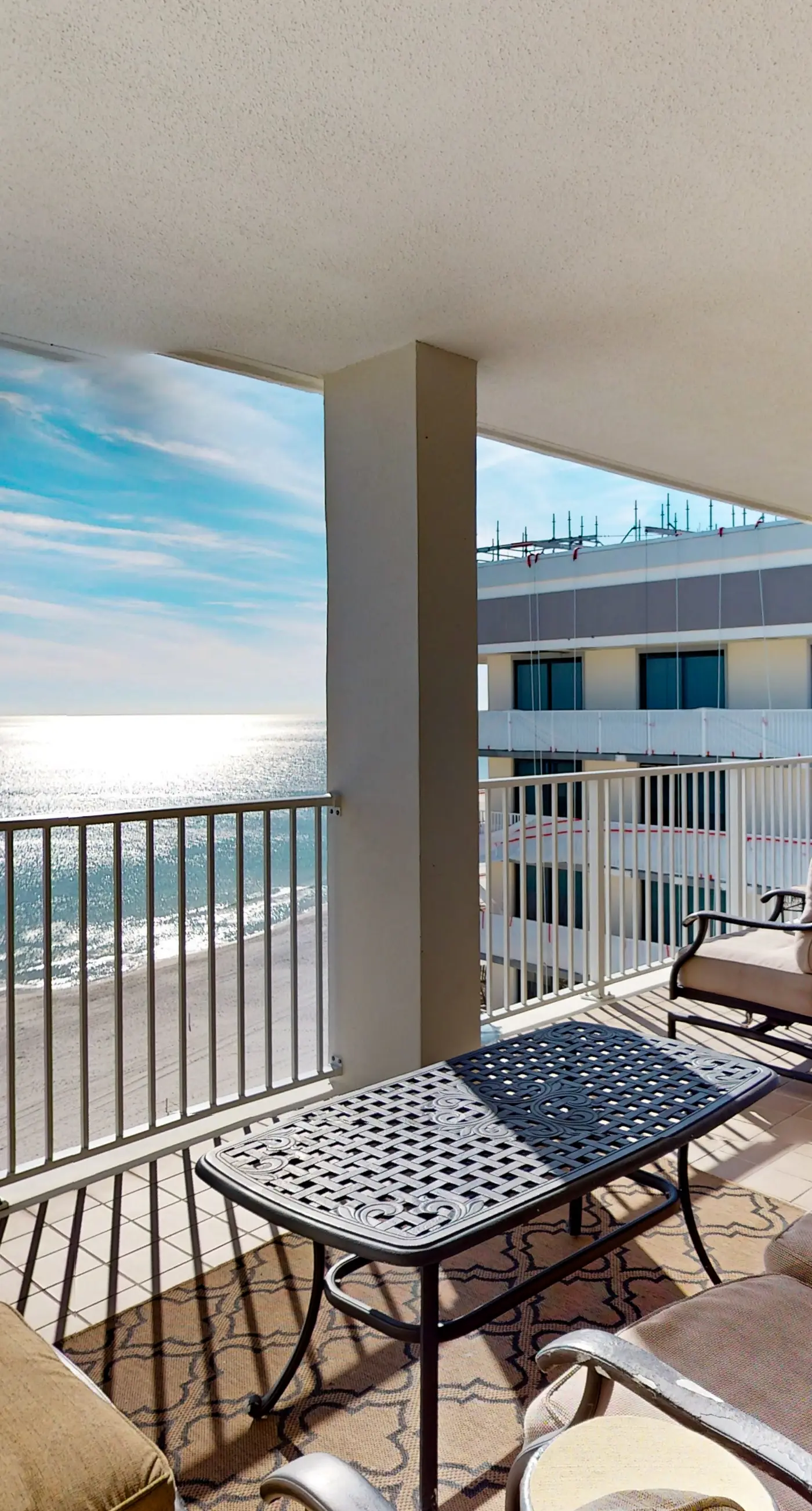 Waterfront oasis with direct beach access, pool, hot tub, & gym