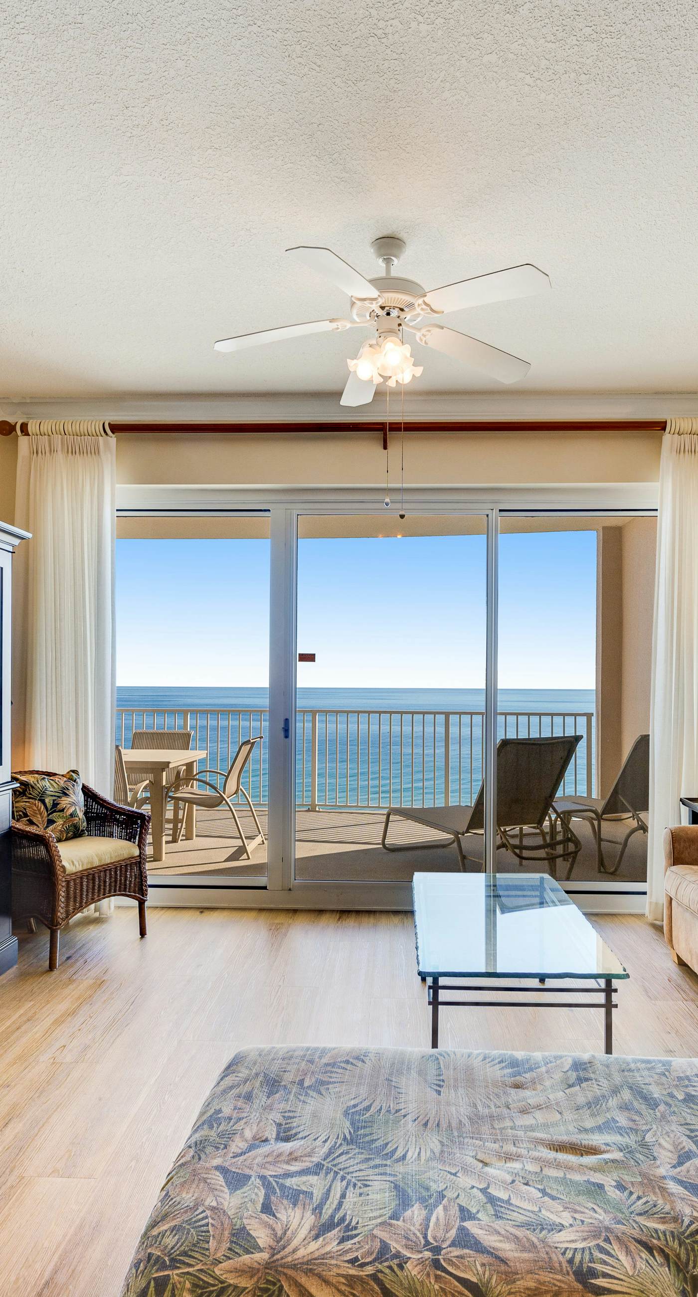 Gulf-front condo with balcony, central AC, pools, hot tubs & beach access