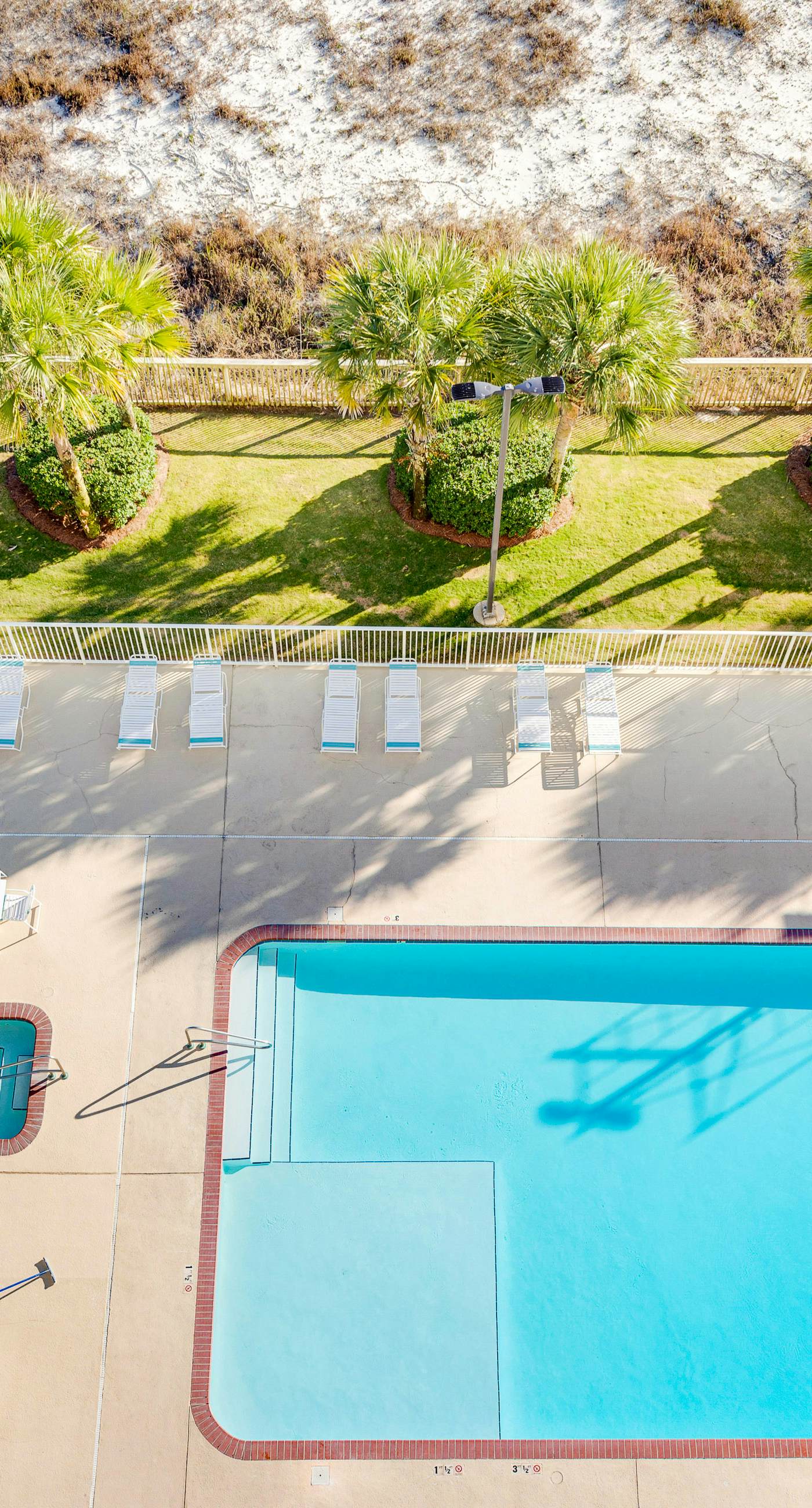 Gulf-front condo with balcony, central AC, pools, hot tubs & beach access