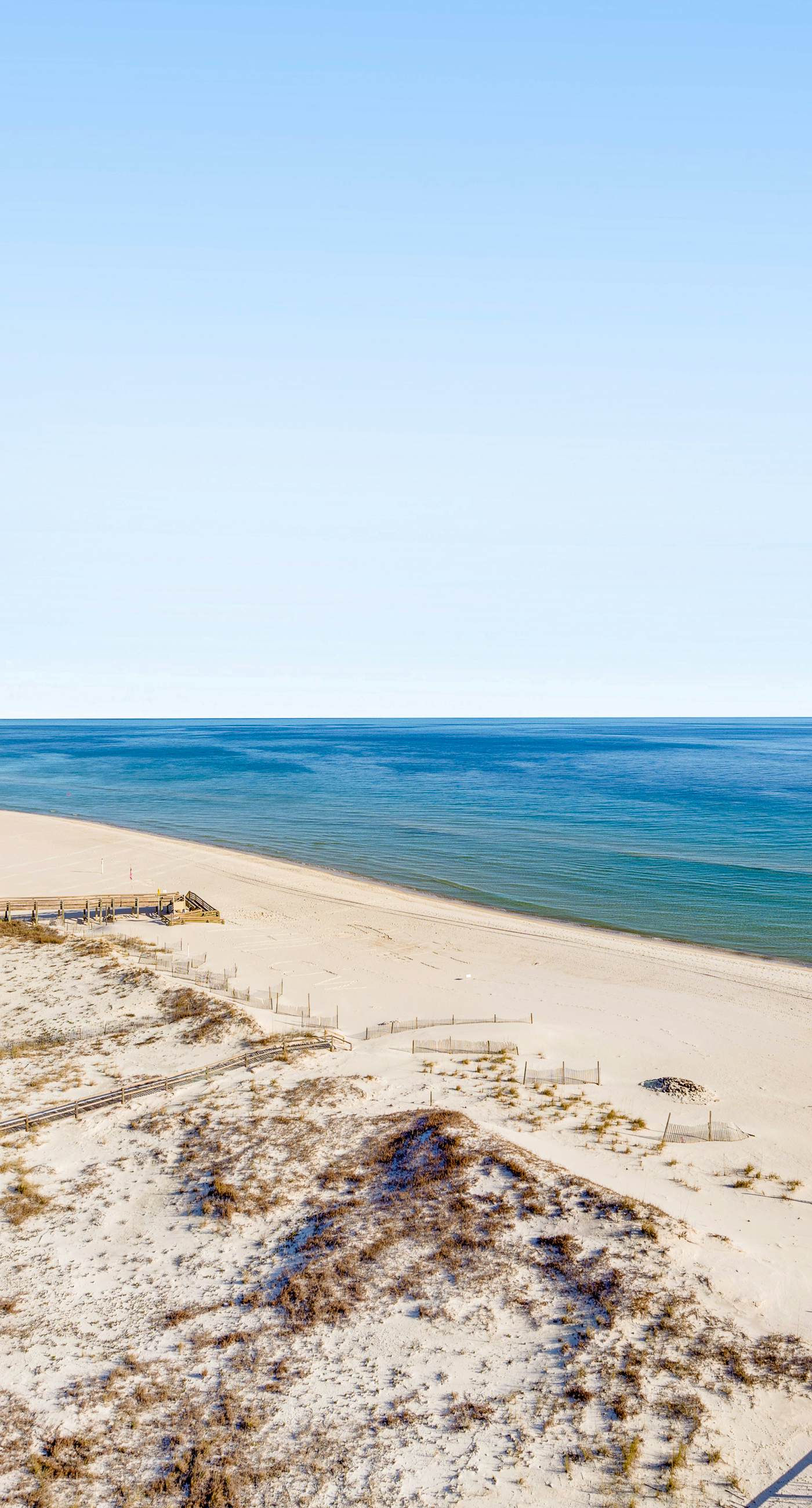 Gulf-front condo with balcony, central AC, pools, hot tubs & beach access