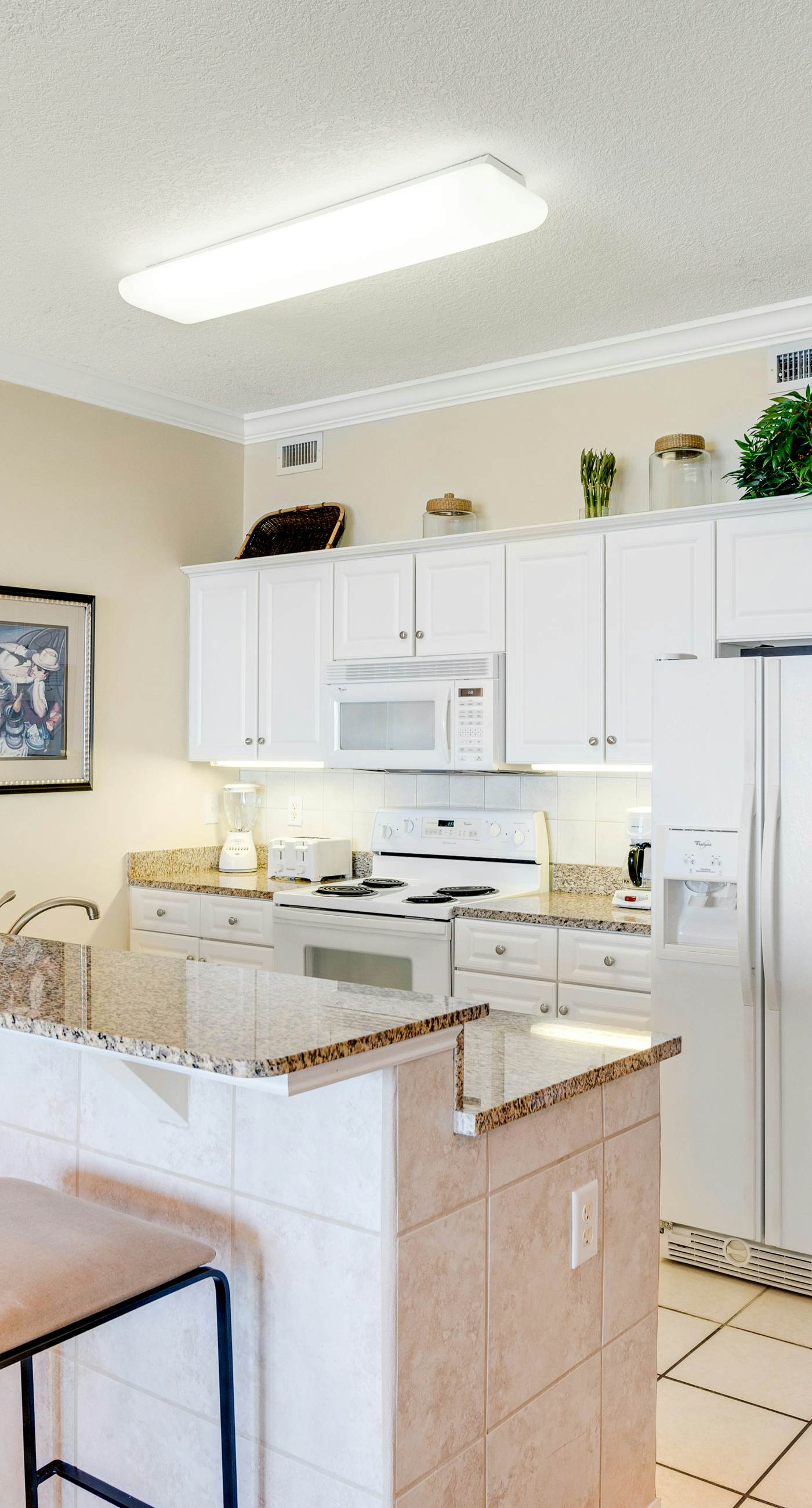 Gulf-front condo with balcony, central AC, pools, hot tubs & beach access