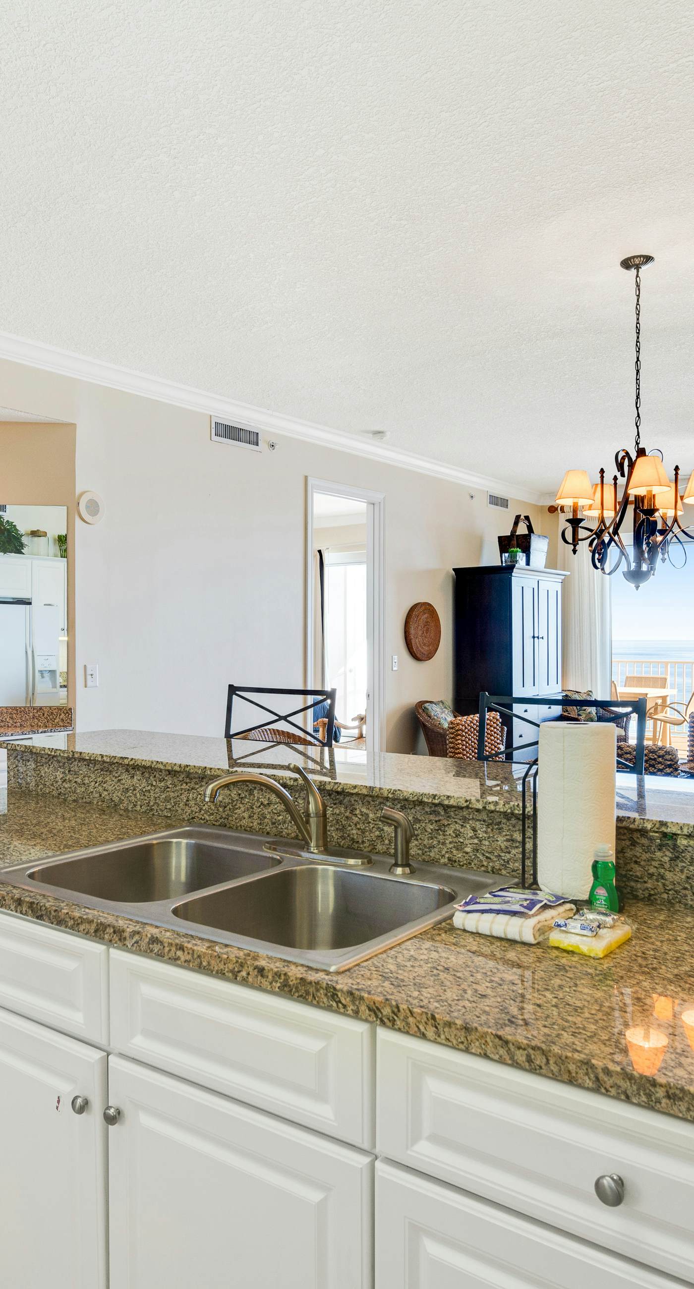 Gulf-front condo with balcony, central AC, pools, hot tubs & beach access