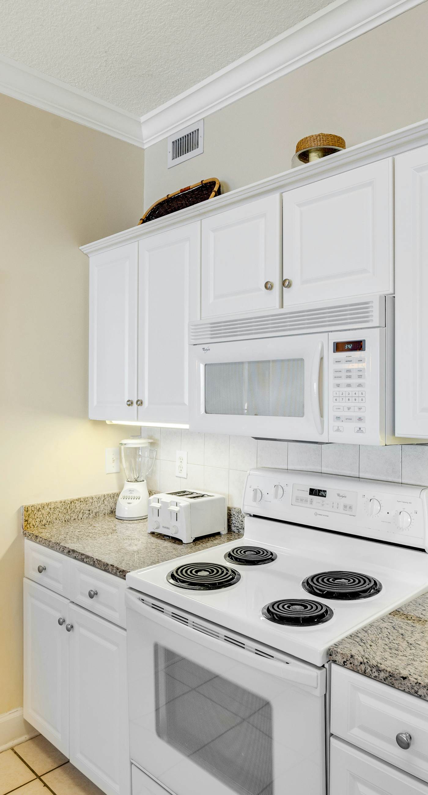 Gulf-front condo with balcony, central AC, pools, hot tubs & beach access