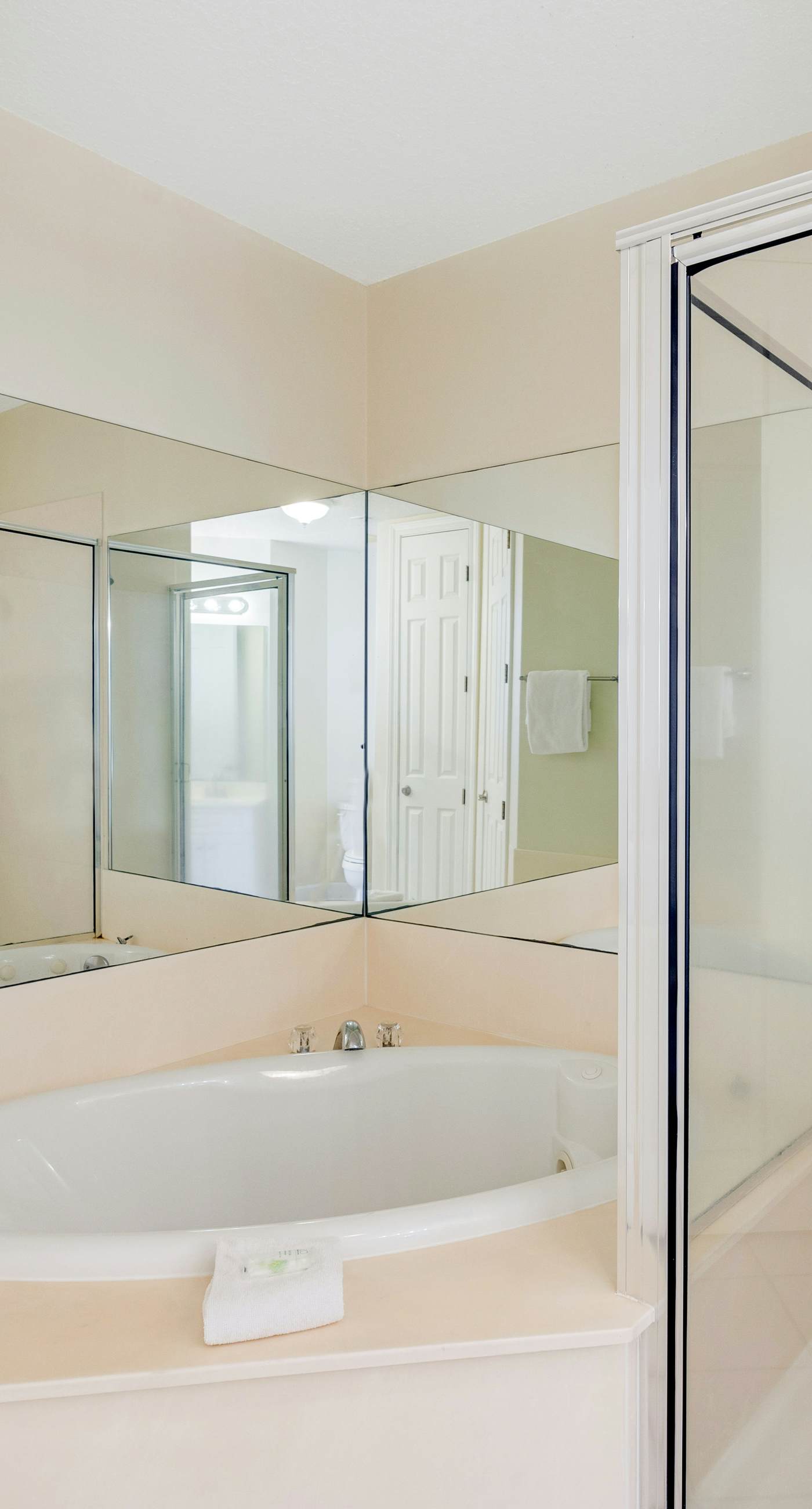 Gulf-front condo with balcony, central AC, pools, hot tubs & beach access