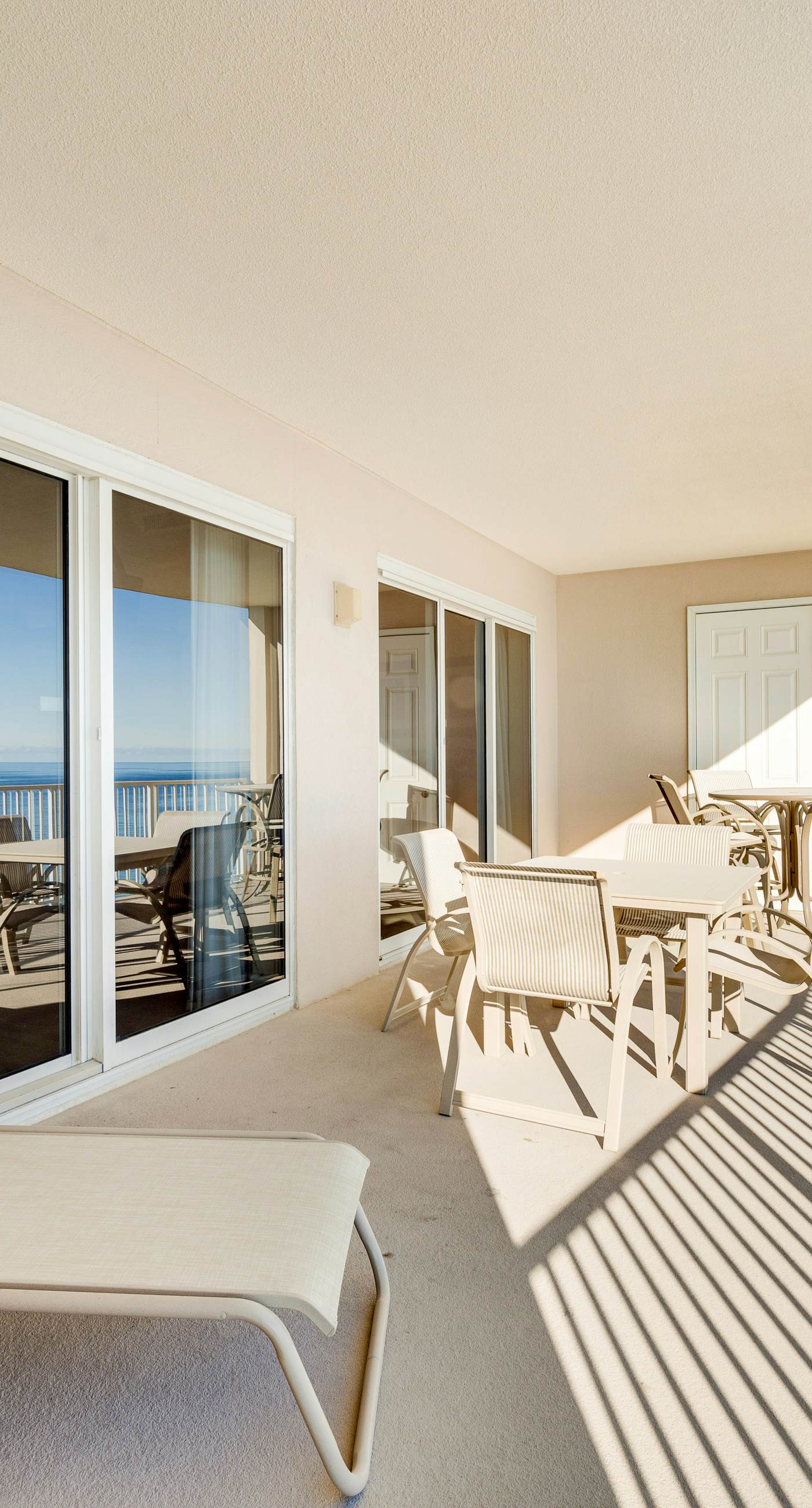 Gulf-front condo with balcony, central AC, pools, hot tubs & beach access