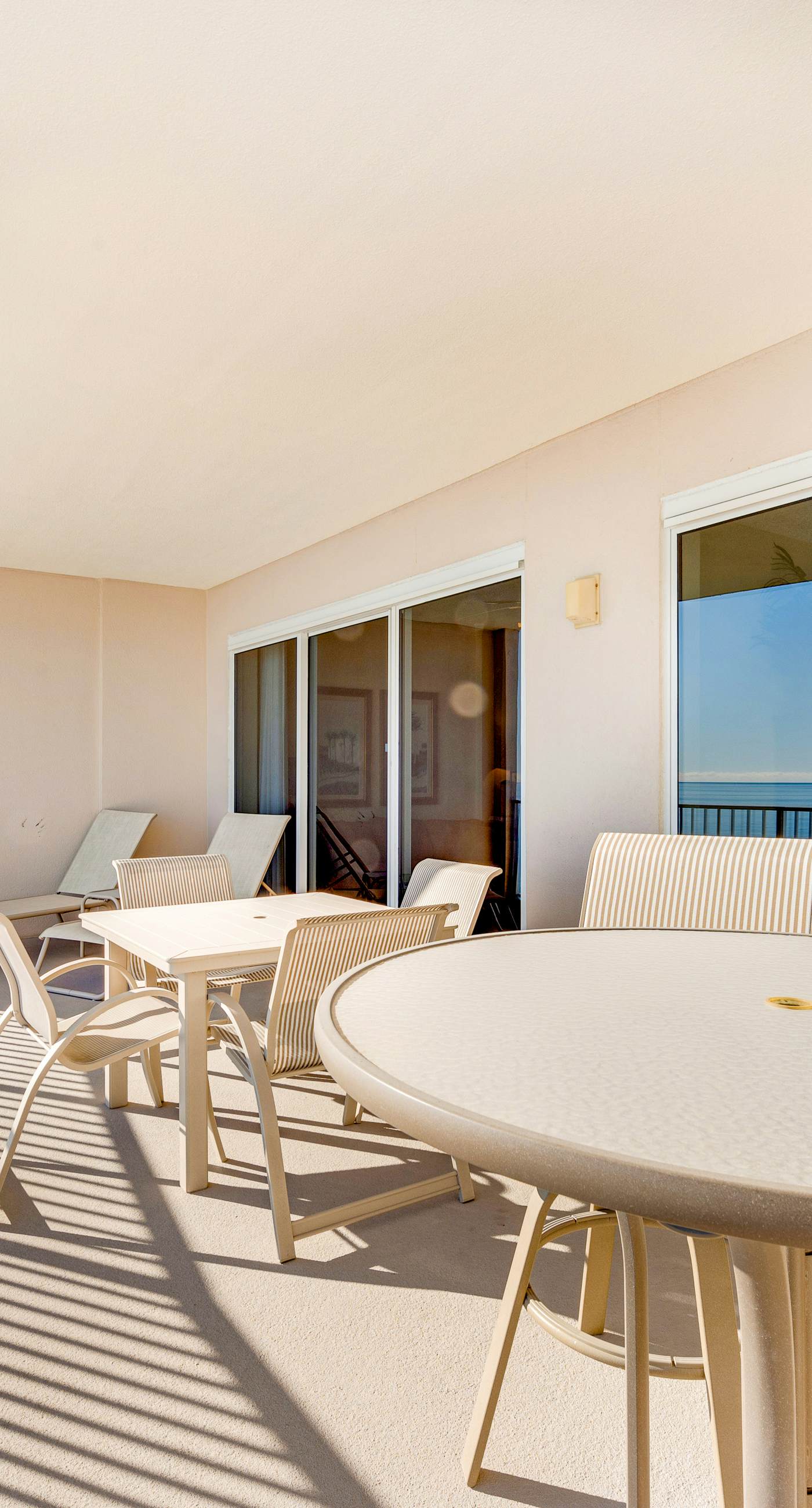Gulf-front condo with balcony, central AC, pools, hot tubs & beach access
