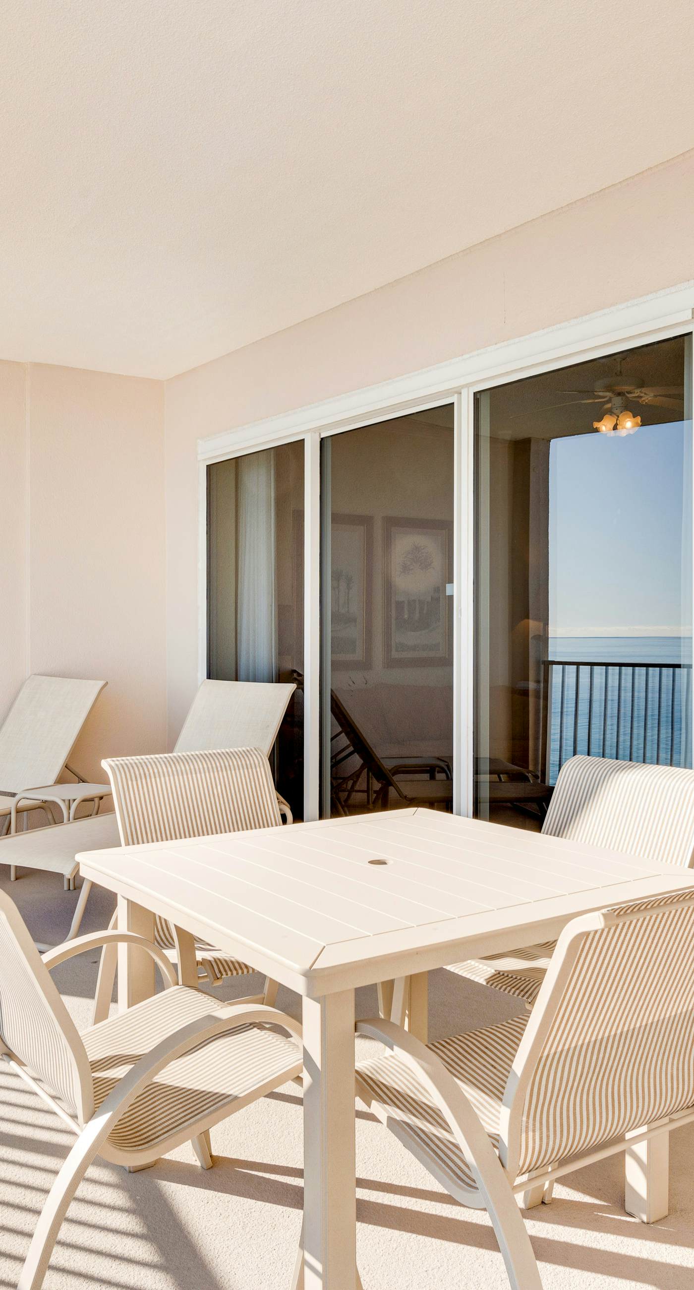 Gulf-front condo with balcony, central AC, pools, hot tubs & beach access