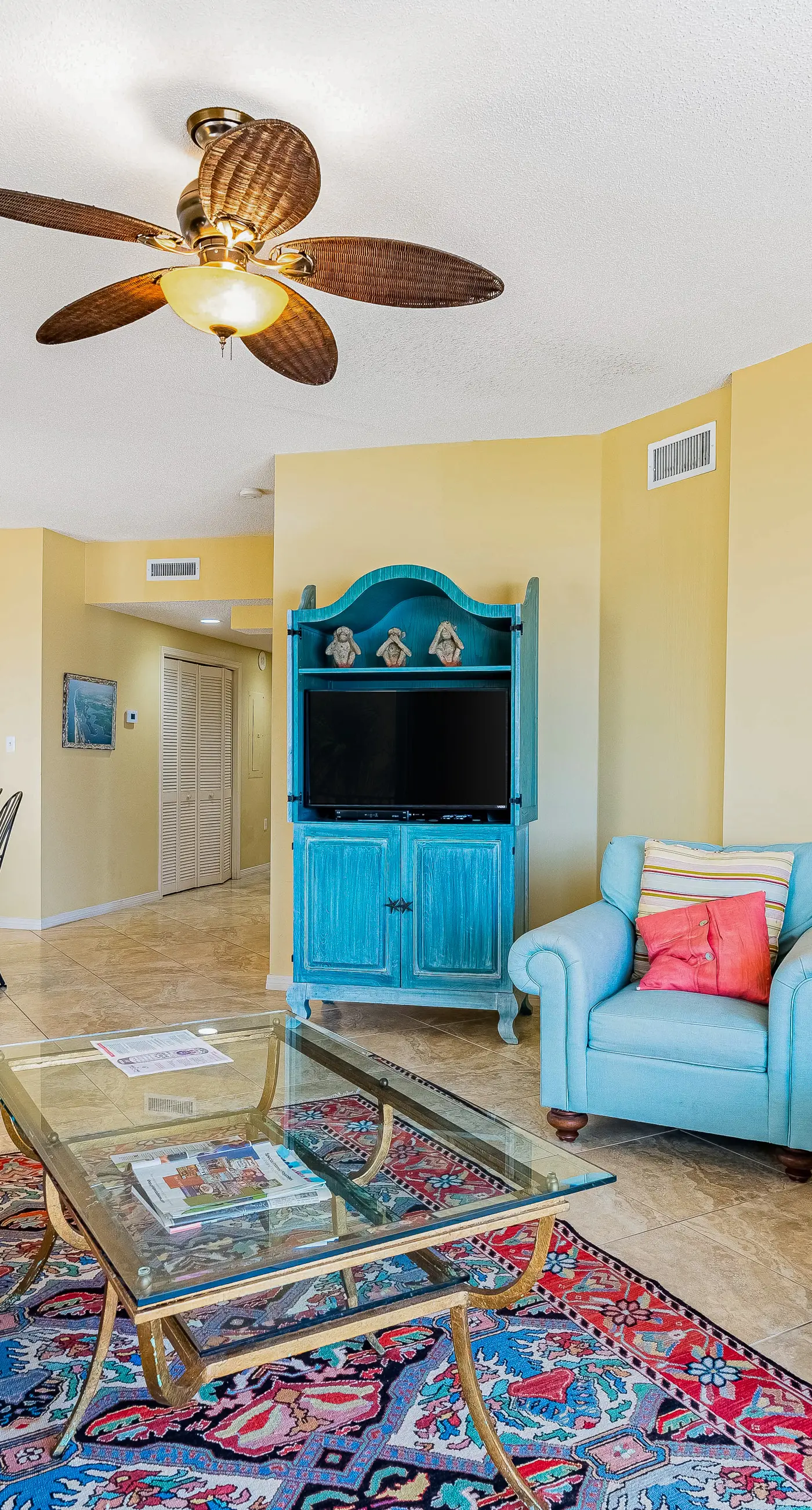 Gulf-front condo with spacious balcony, resort amenities, and cheerful interior