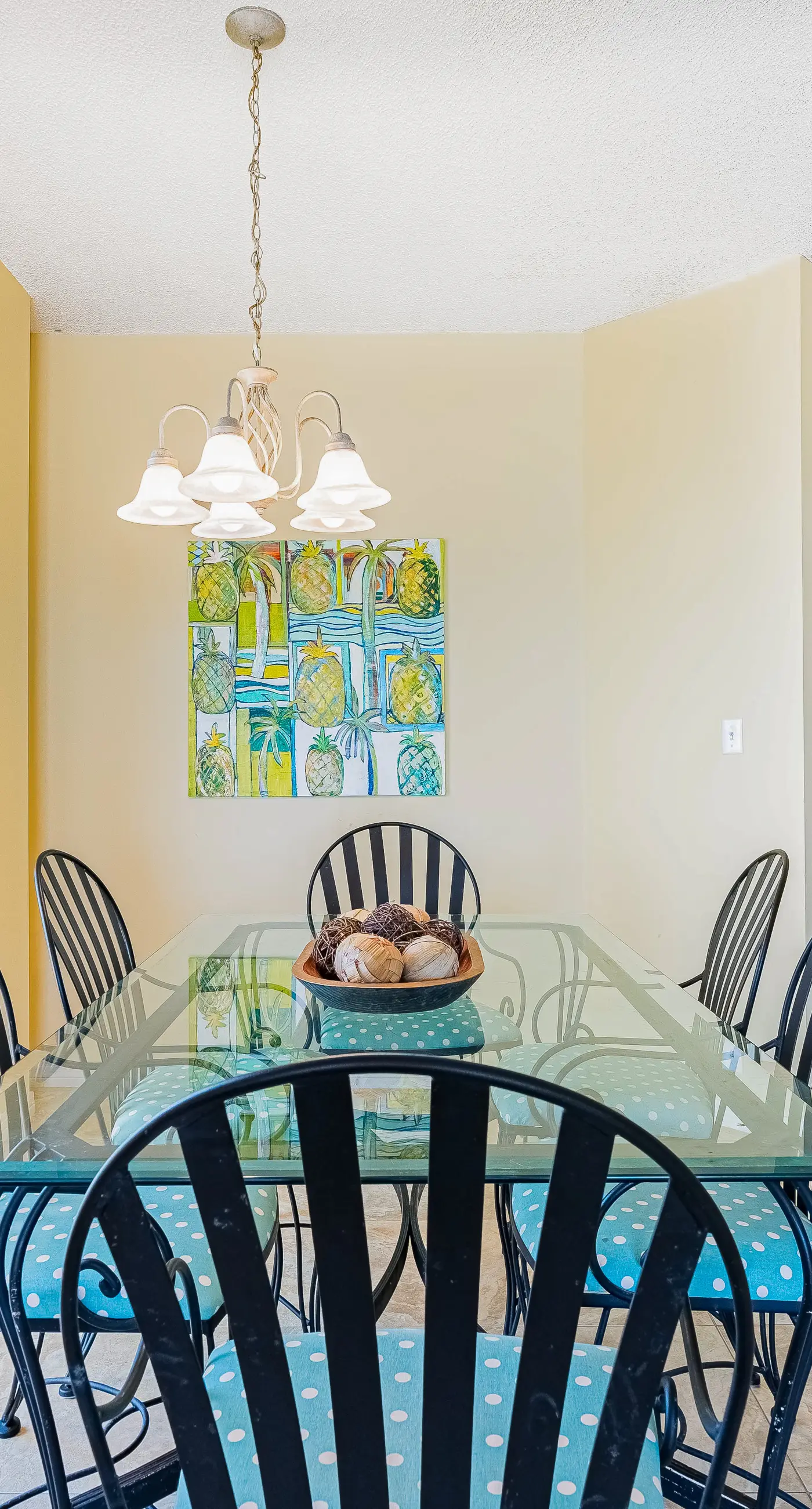 Gulf-front condo with spacious balcony, resort amenities, and cheerful interior