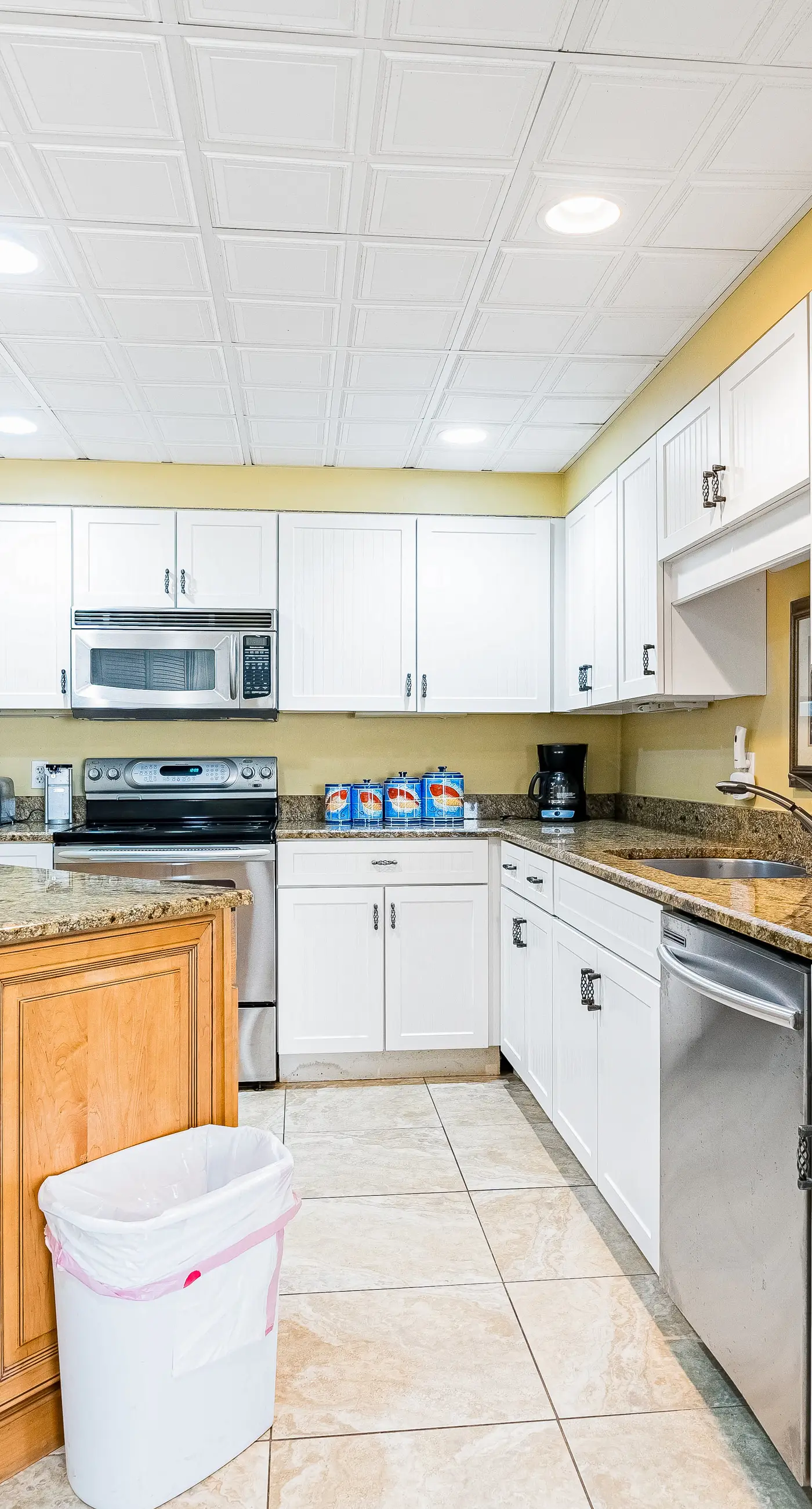 Gulf-front condo with spacious balcony, resort amenities, and cheerful interior