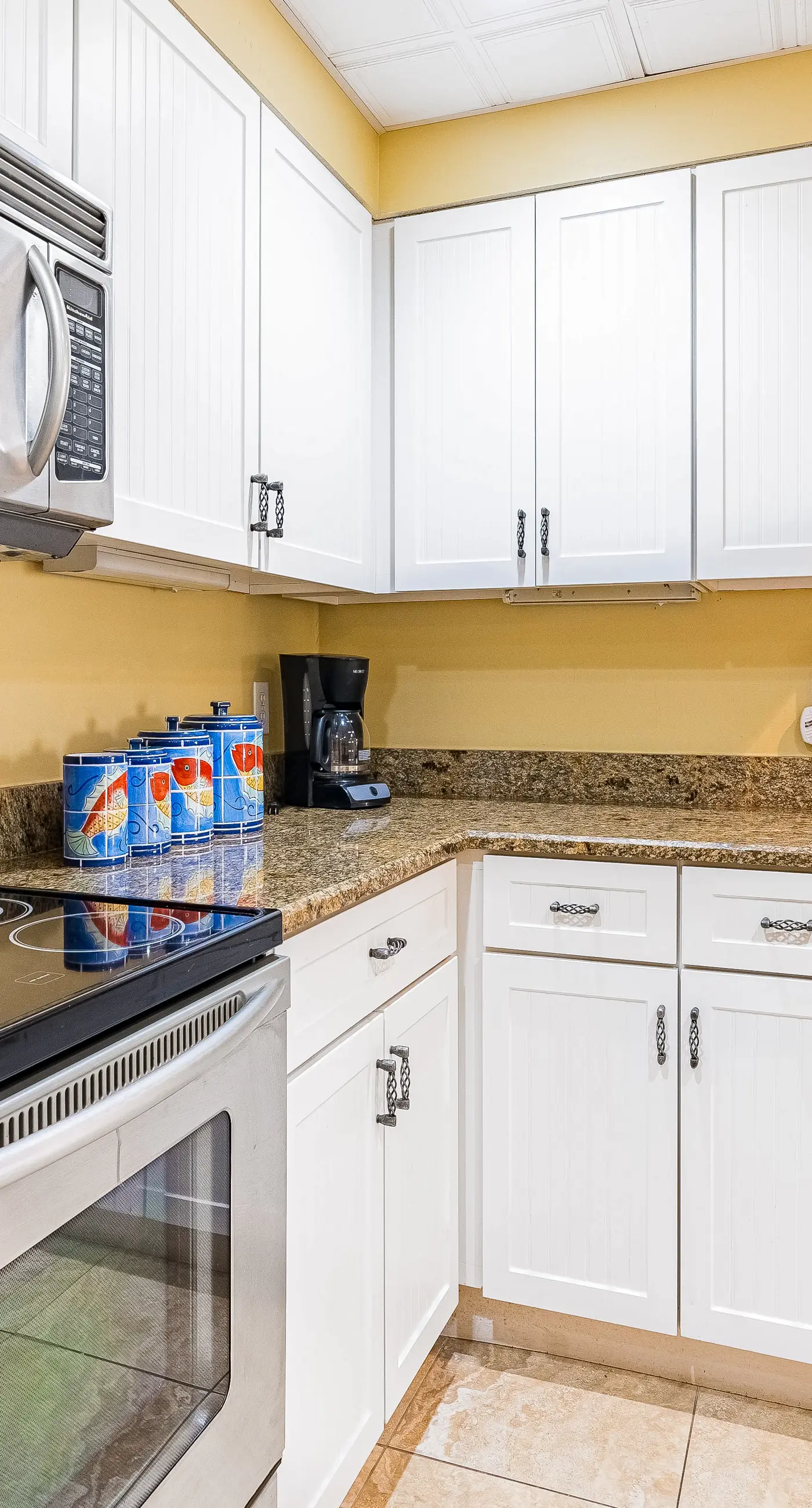 Gulf-front condo with spacious balcony, resort amenities, and cheerful interior