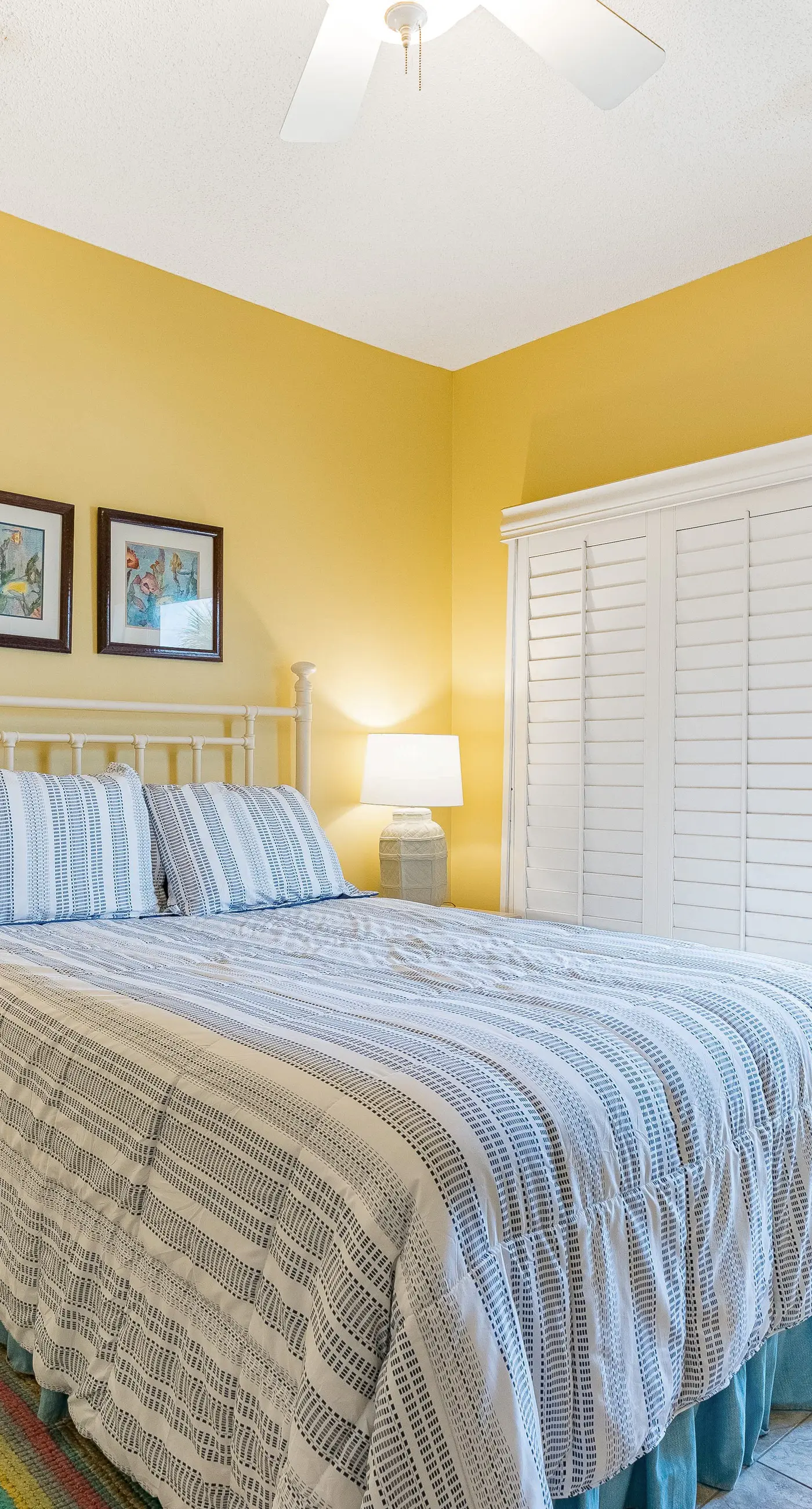 Gulf-front condo with spacious balcony, resort amenities, and cheerful interior