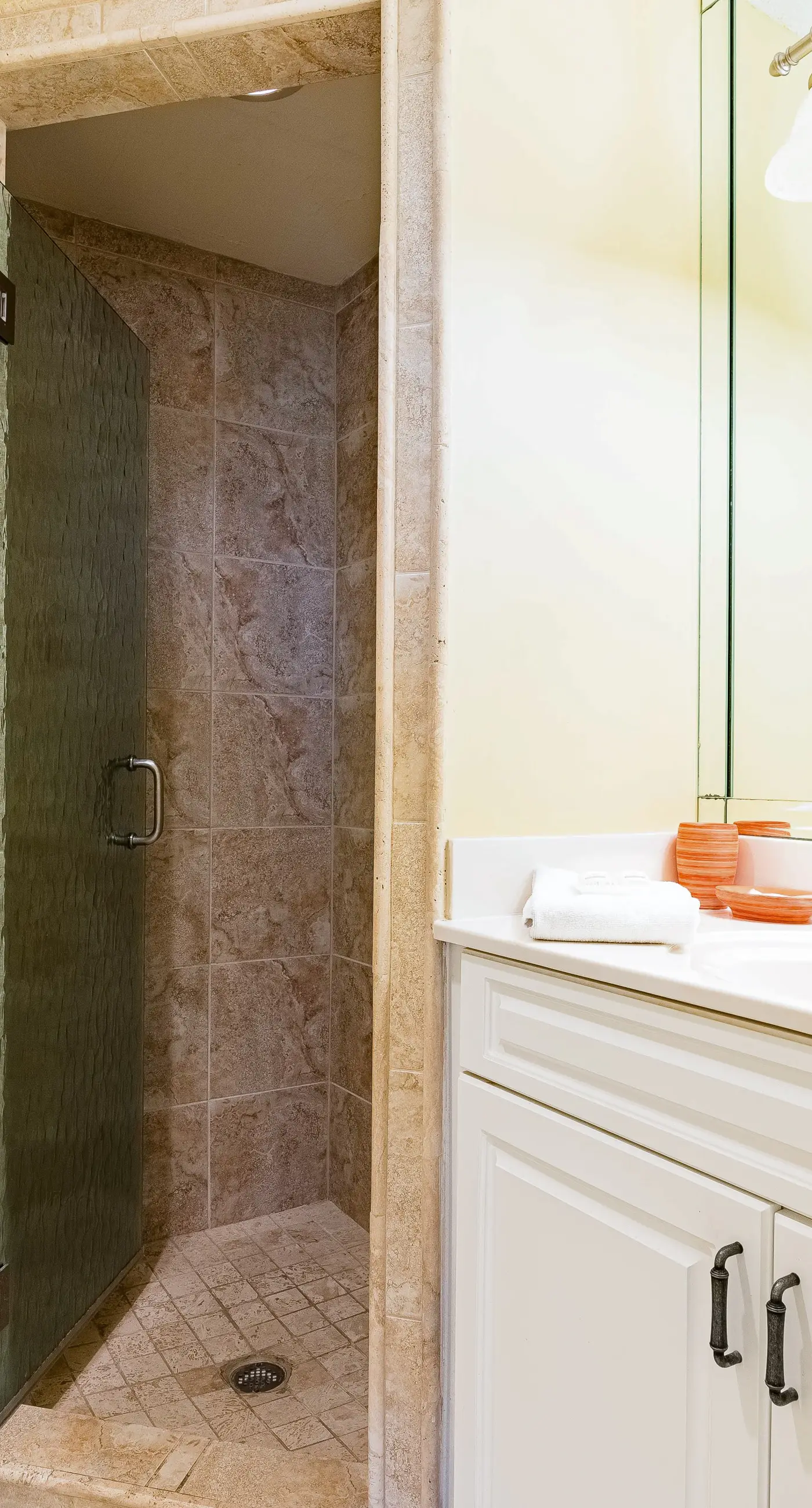 Gulf-front condo with spacious balcony, resort amenities, and cheerful interior