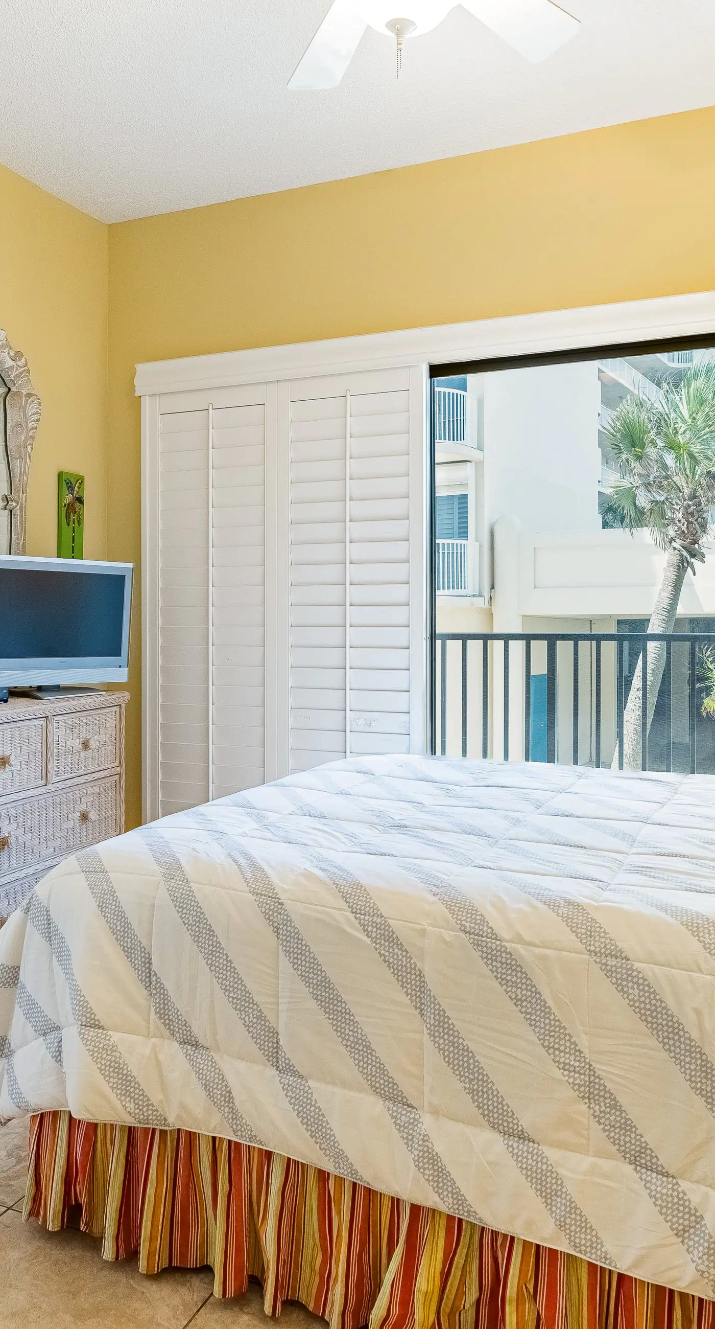 Gulf-front condo with spacious balcony, resort amenities, and cheerful interior