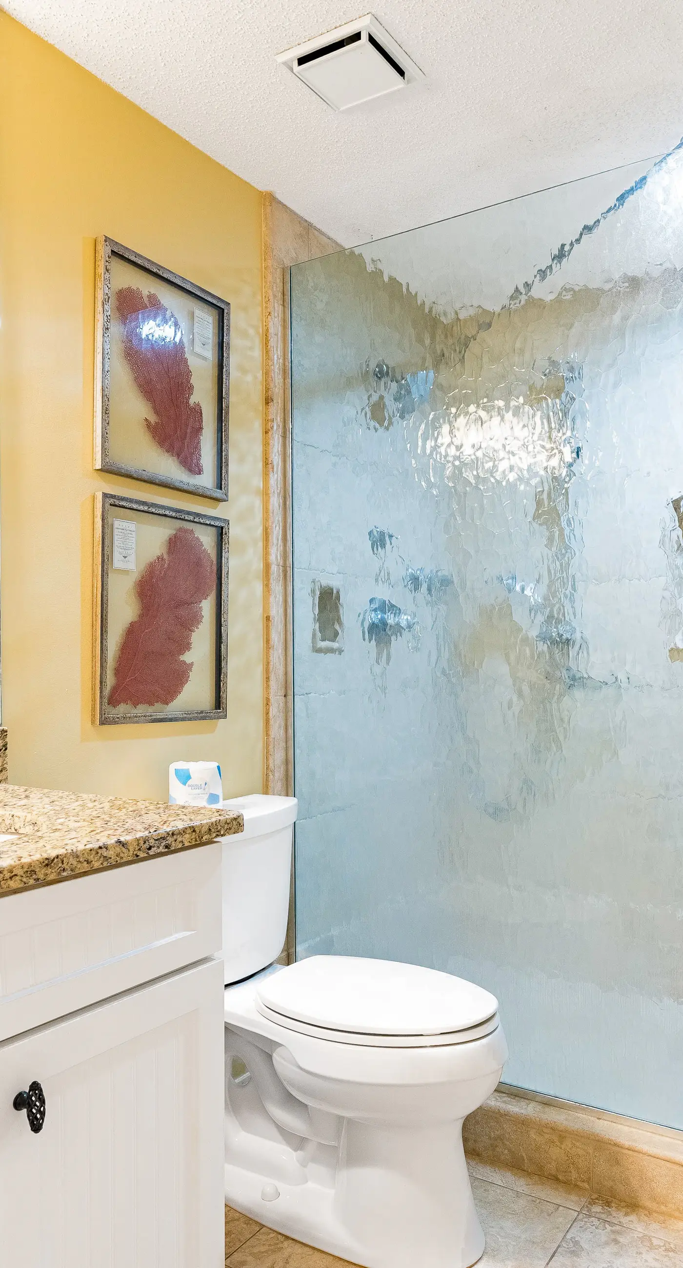 Gulf-front condo with spacious balcony, resort amenities, and cheerful interior