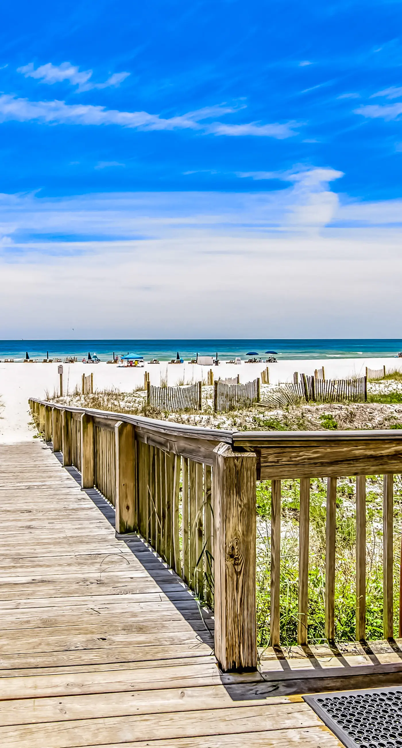 Gulf-front condo with spacious balcony, resort amenities, and cheerful interior