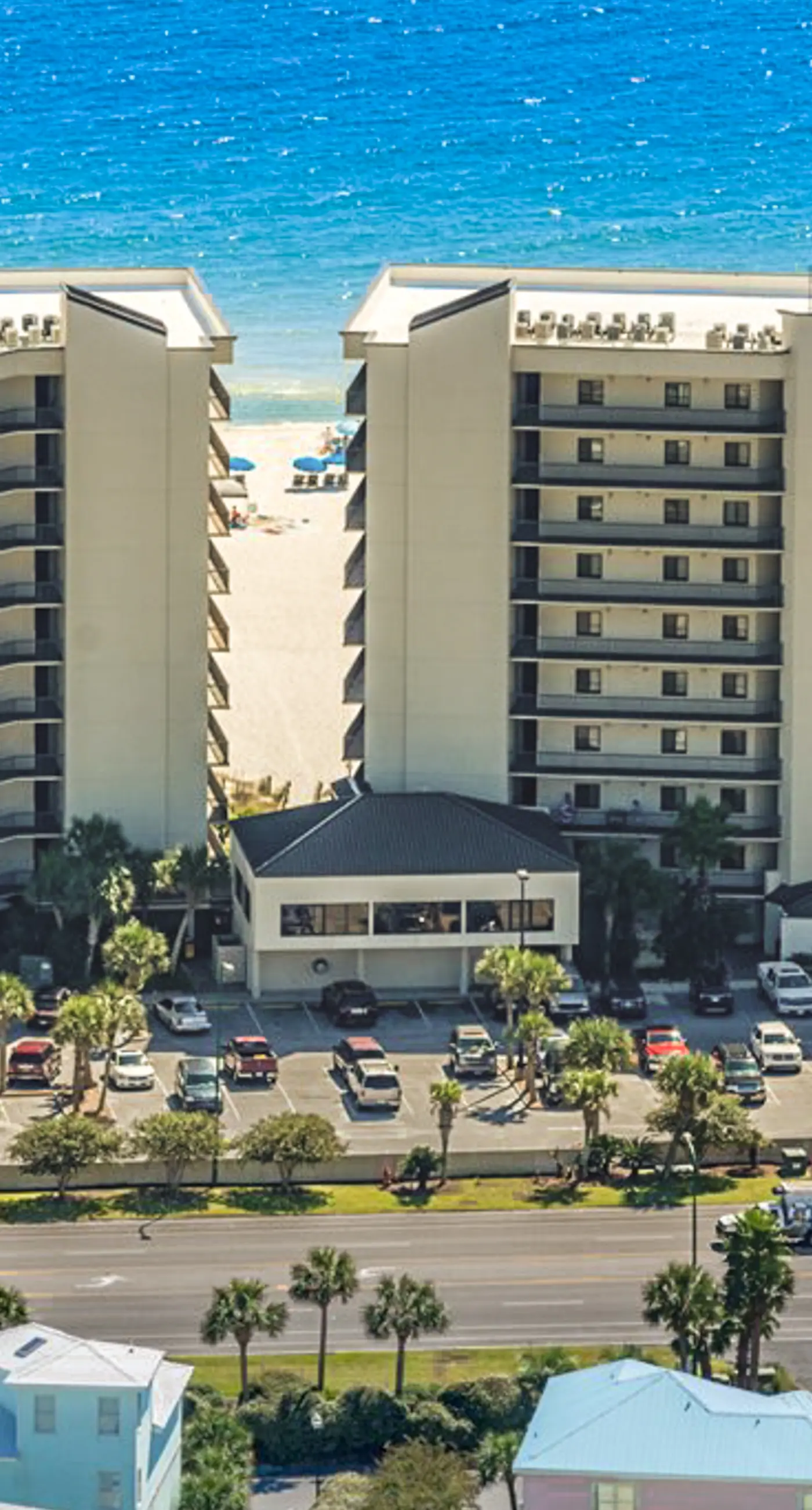 Gulf-front condo with spacious balcony, resort amenities, and cheerful interior