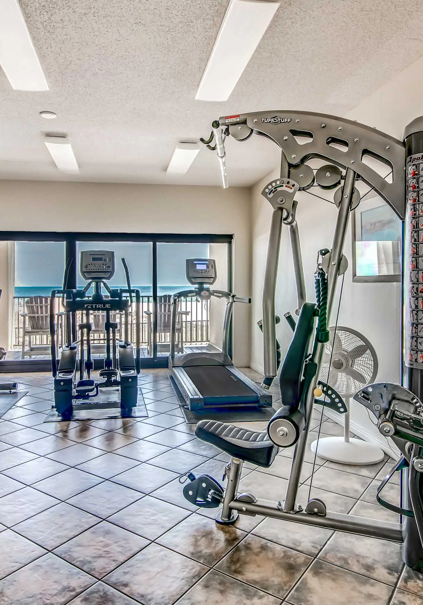 Gulf-front condo with spacious balcony, resort amenities, and cheerful interior