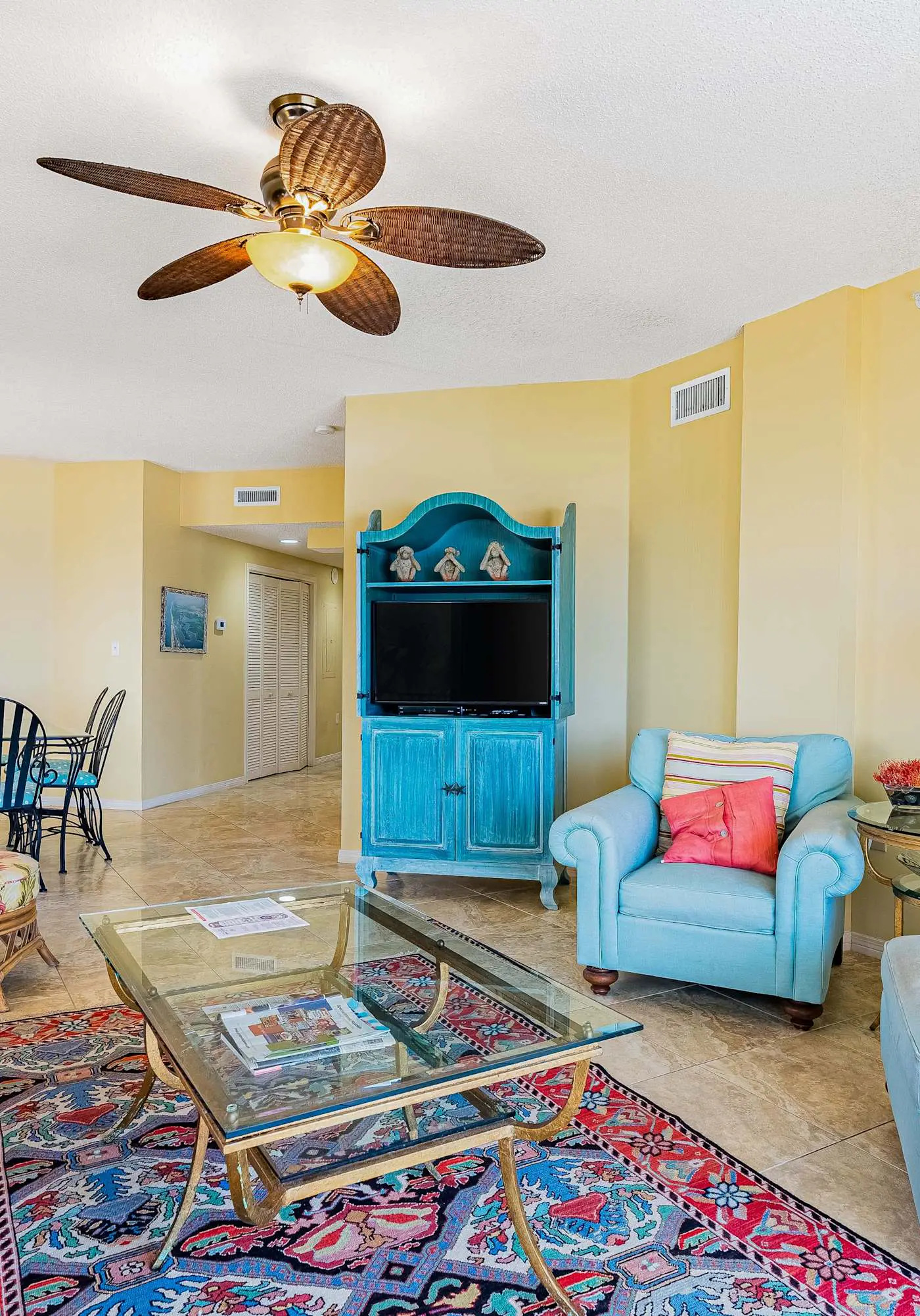 Gulf-front condo with spacious balcony, resort amenities, and cheerful interior