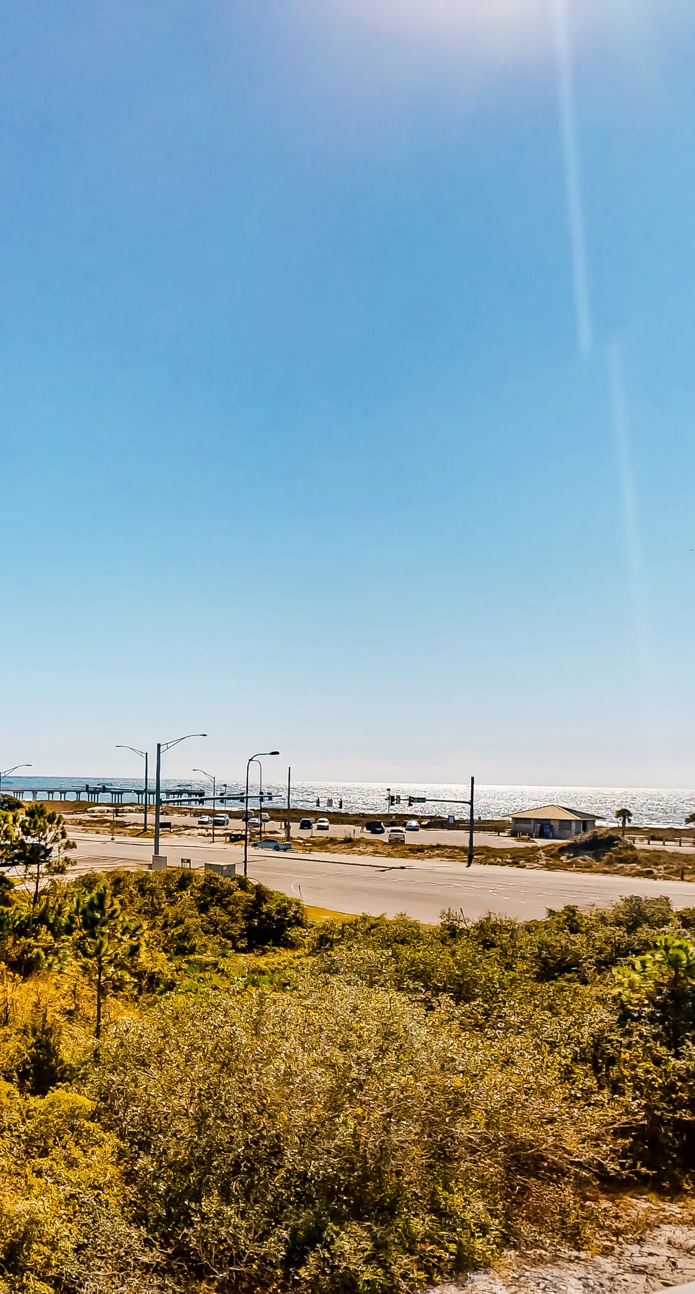 Gulf view condo with pool & fitness center - balcony, open layout, and W/D