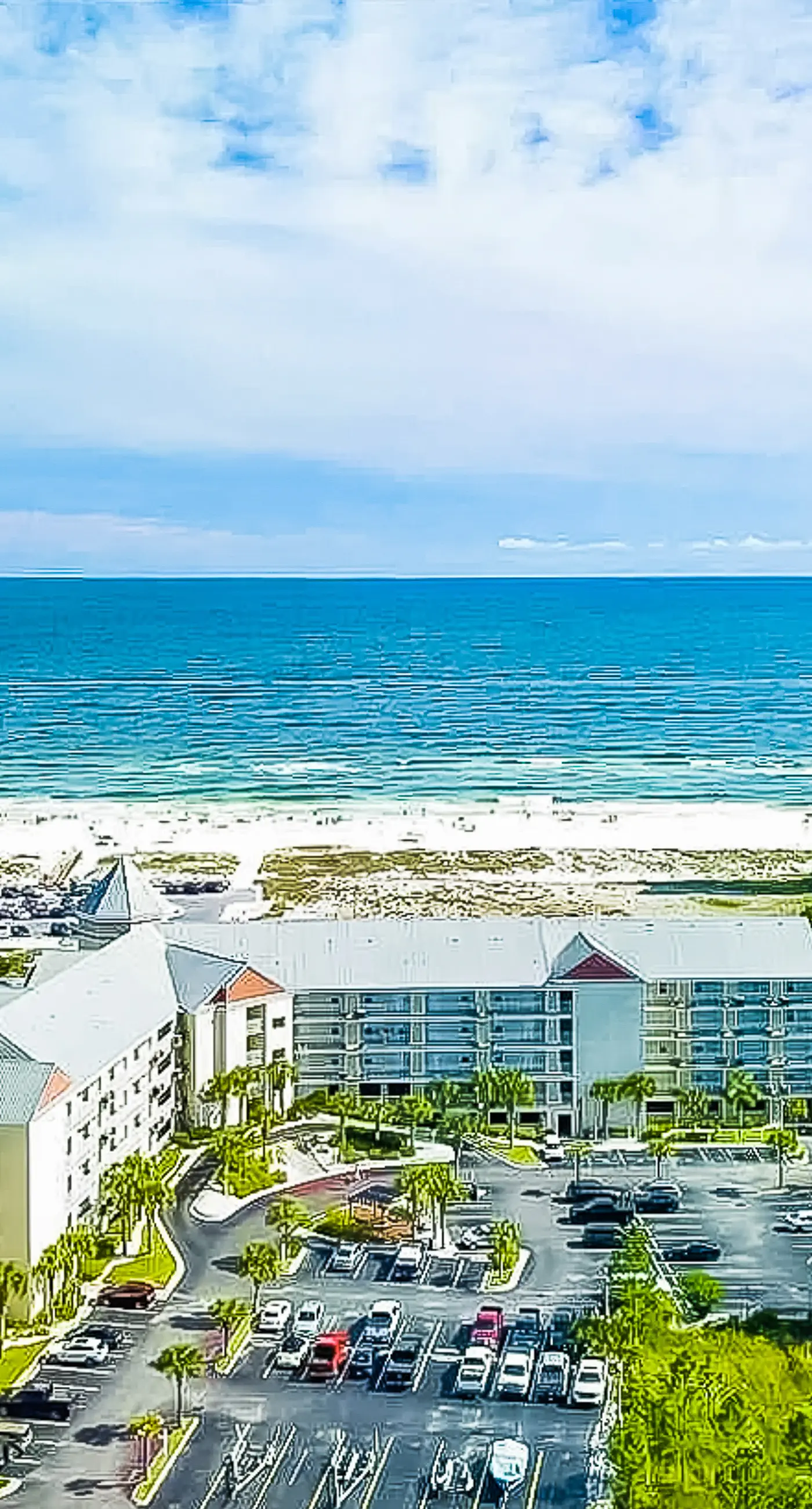 Gulf view condo with pool & fitness center - balcony, open layout, and W/D