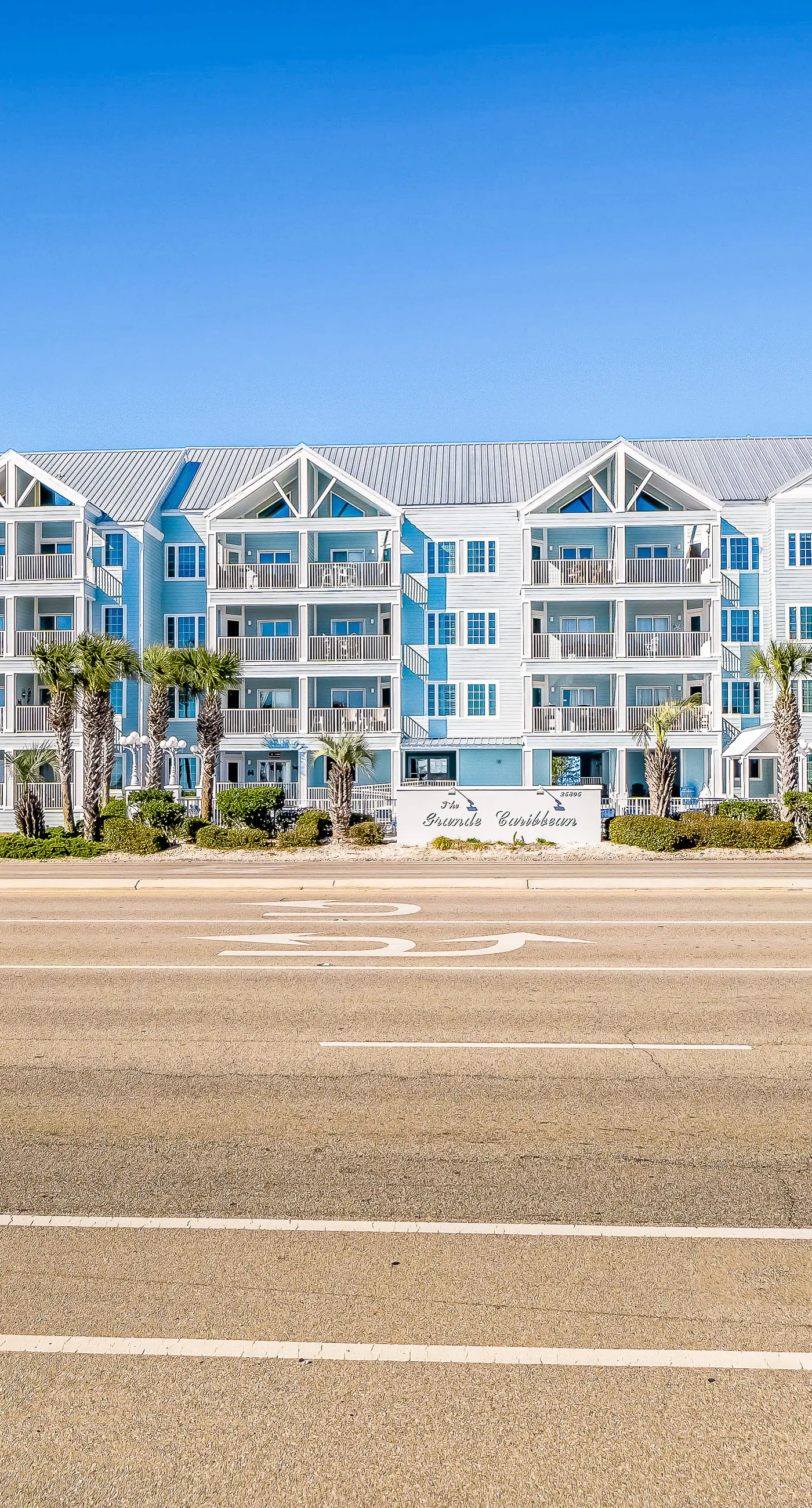 Gulf view condo with pool & fitness center - balcony, open layout, and W/D