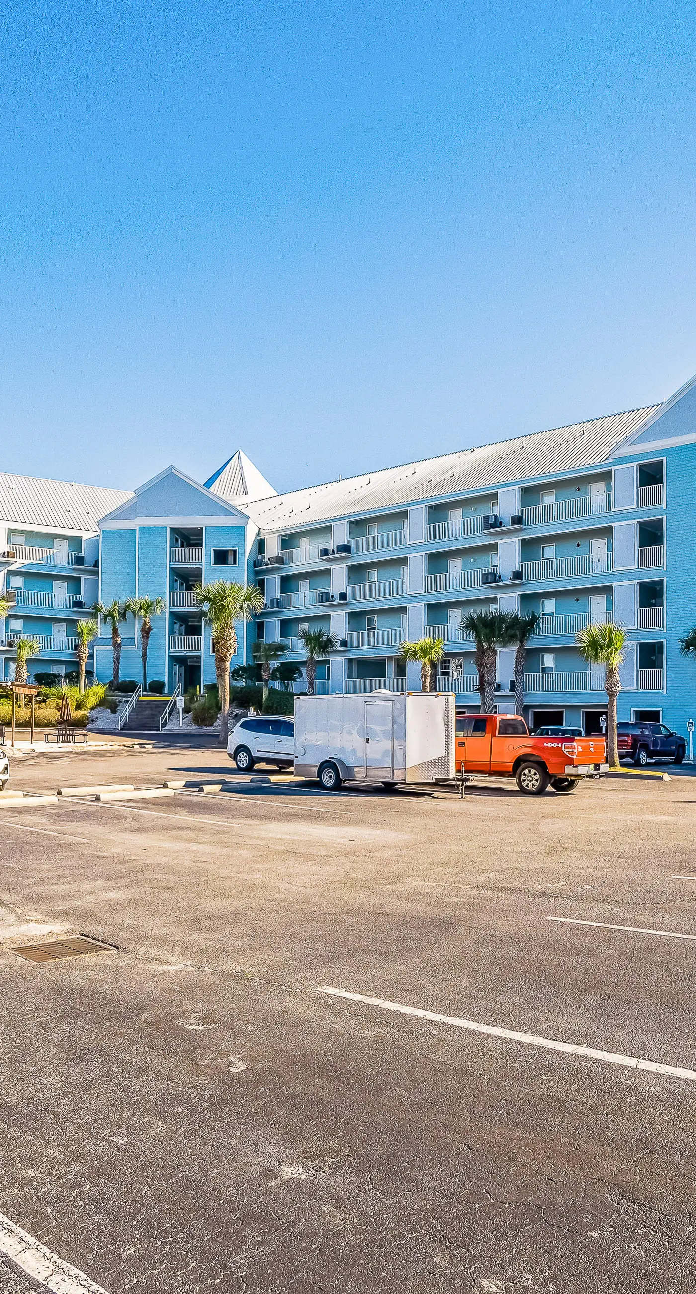 Gulf view condo with pool & fitness center - balcony, open layout, and W/D