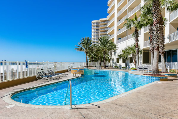 Upscale beachfront retreat w/private balcony, resort pool, sauna, & beach access