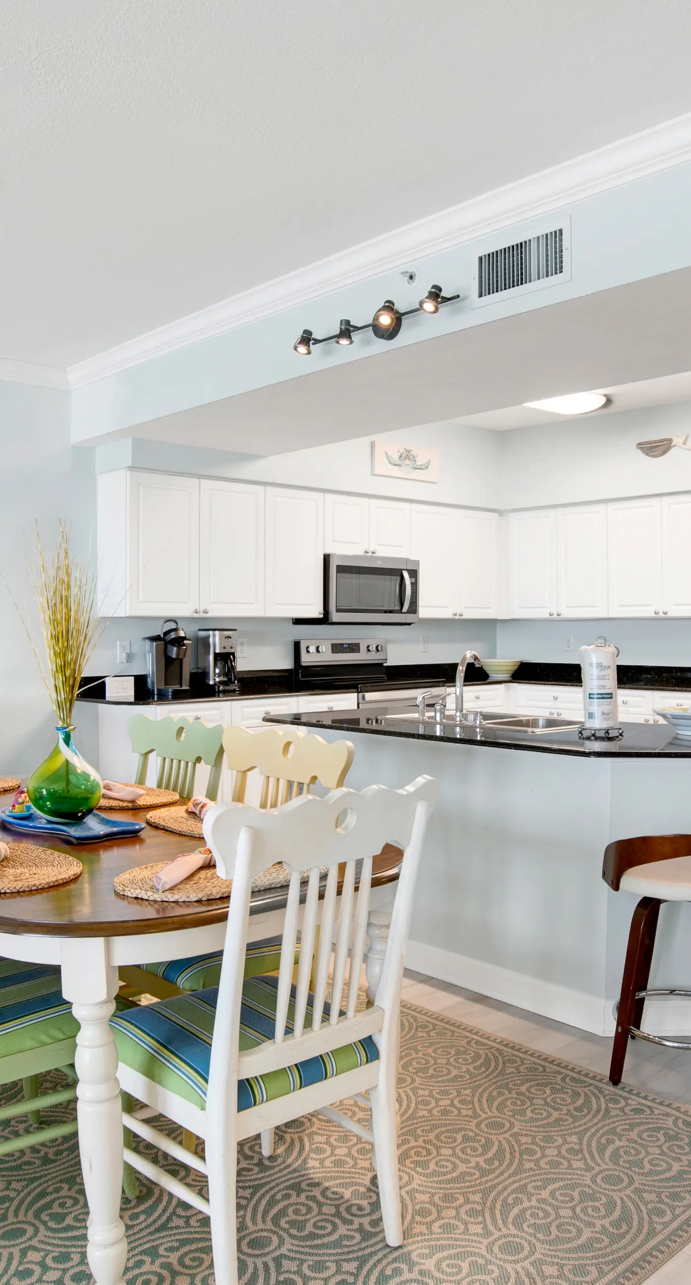 Upscale beachfront retreat w/private balcony, resort pool, sauna, & beach access