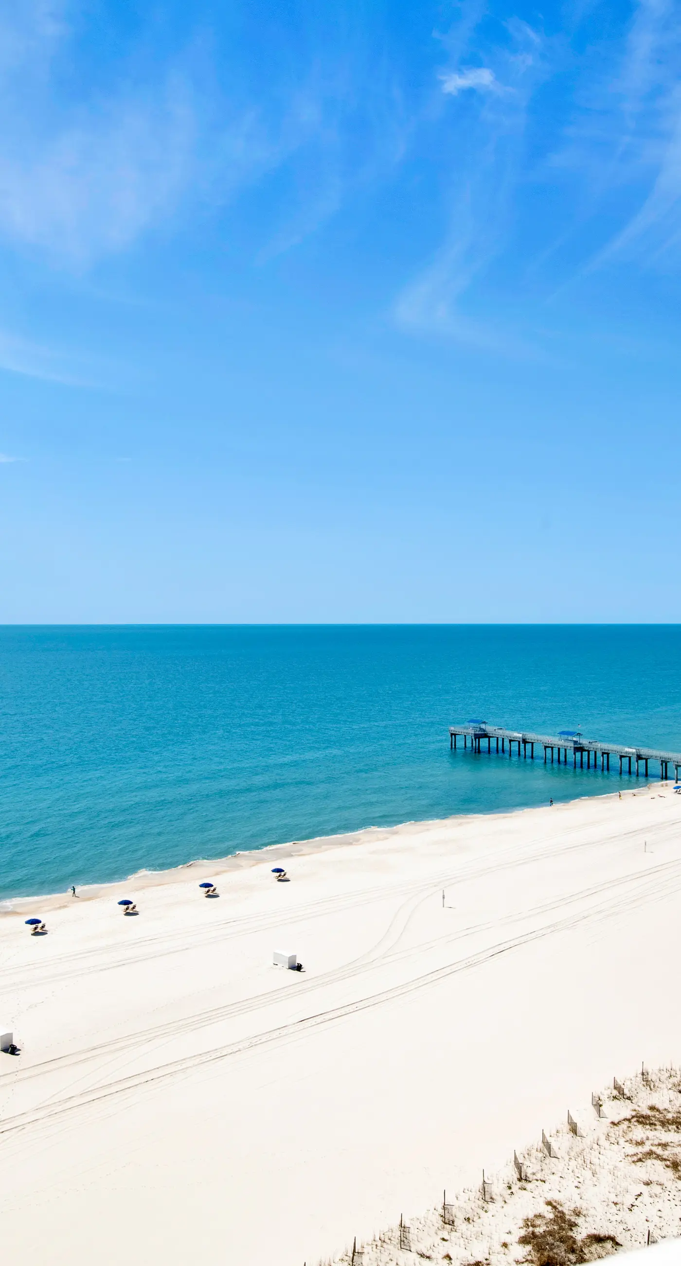 Upscale beachfront retreat w/private balcony, resort pool, sauna, & beach access